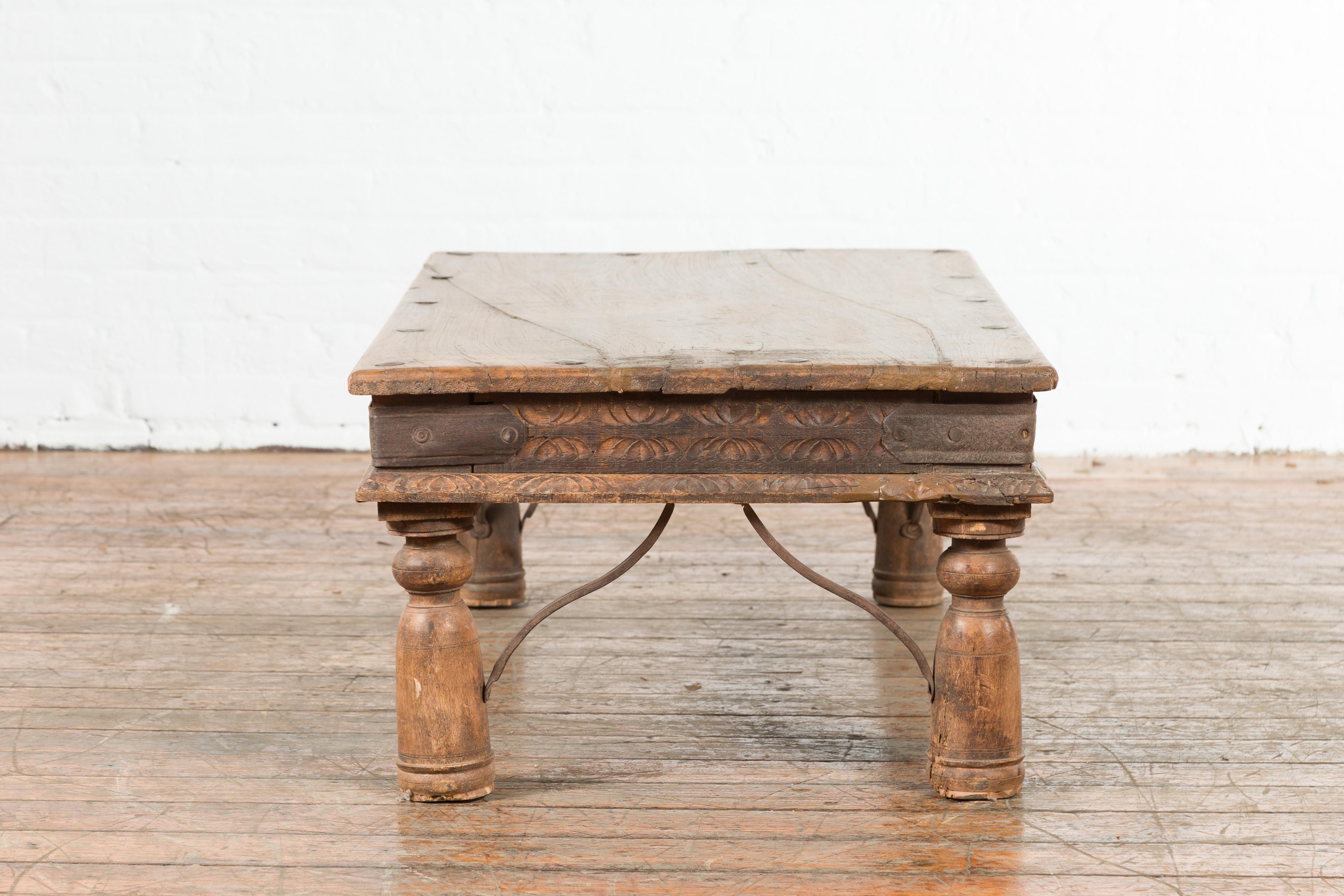 19th Century Indian Rustic Coffee Table with Iron Accents and Carved Apron 3