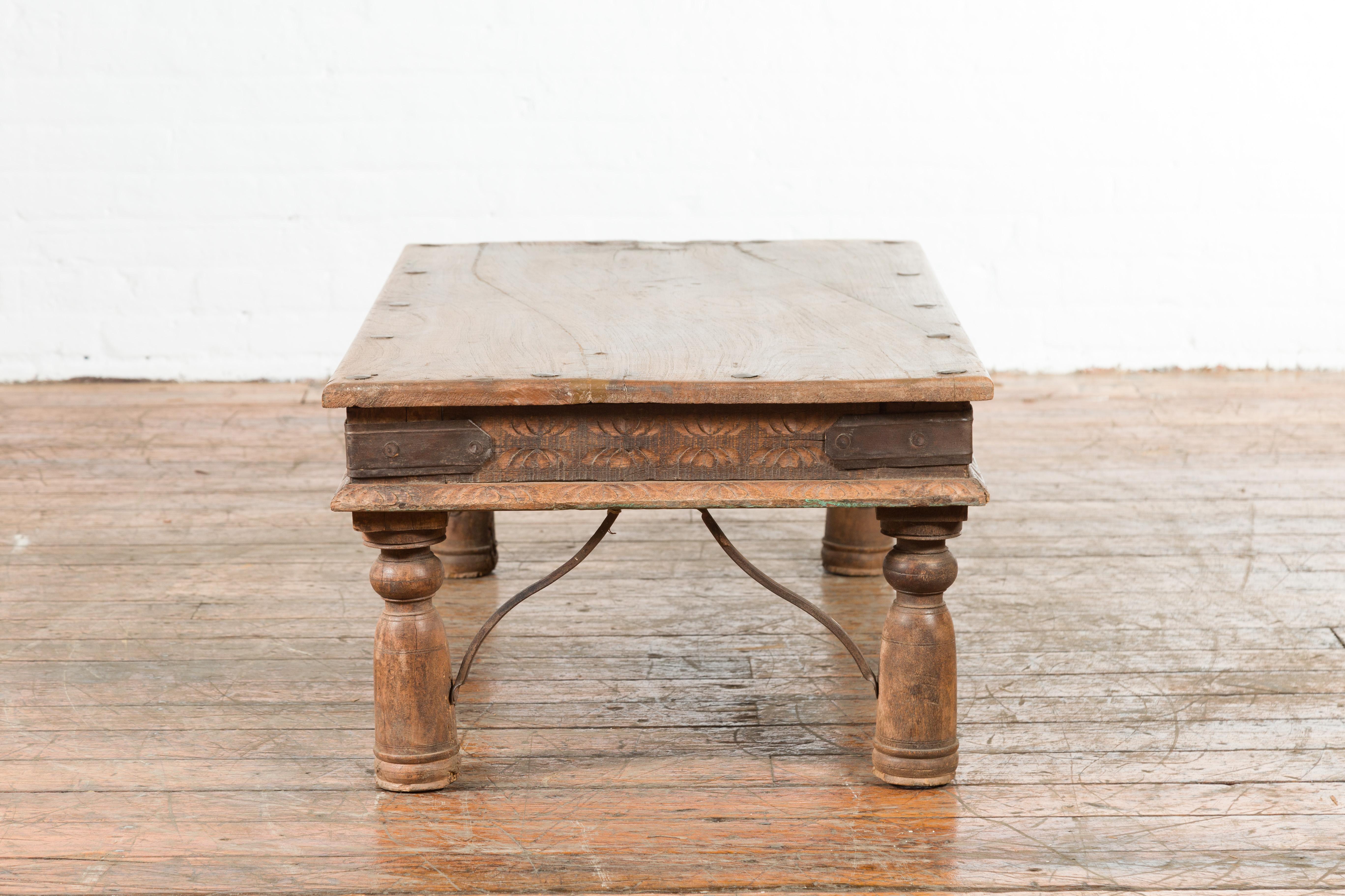 19th Century Indian Rustic Coffee Table with Iron Accents and Carved Apron 6