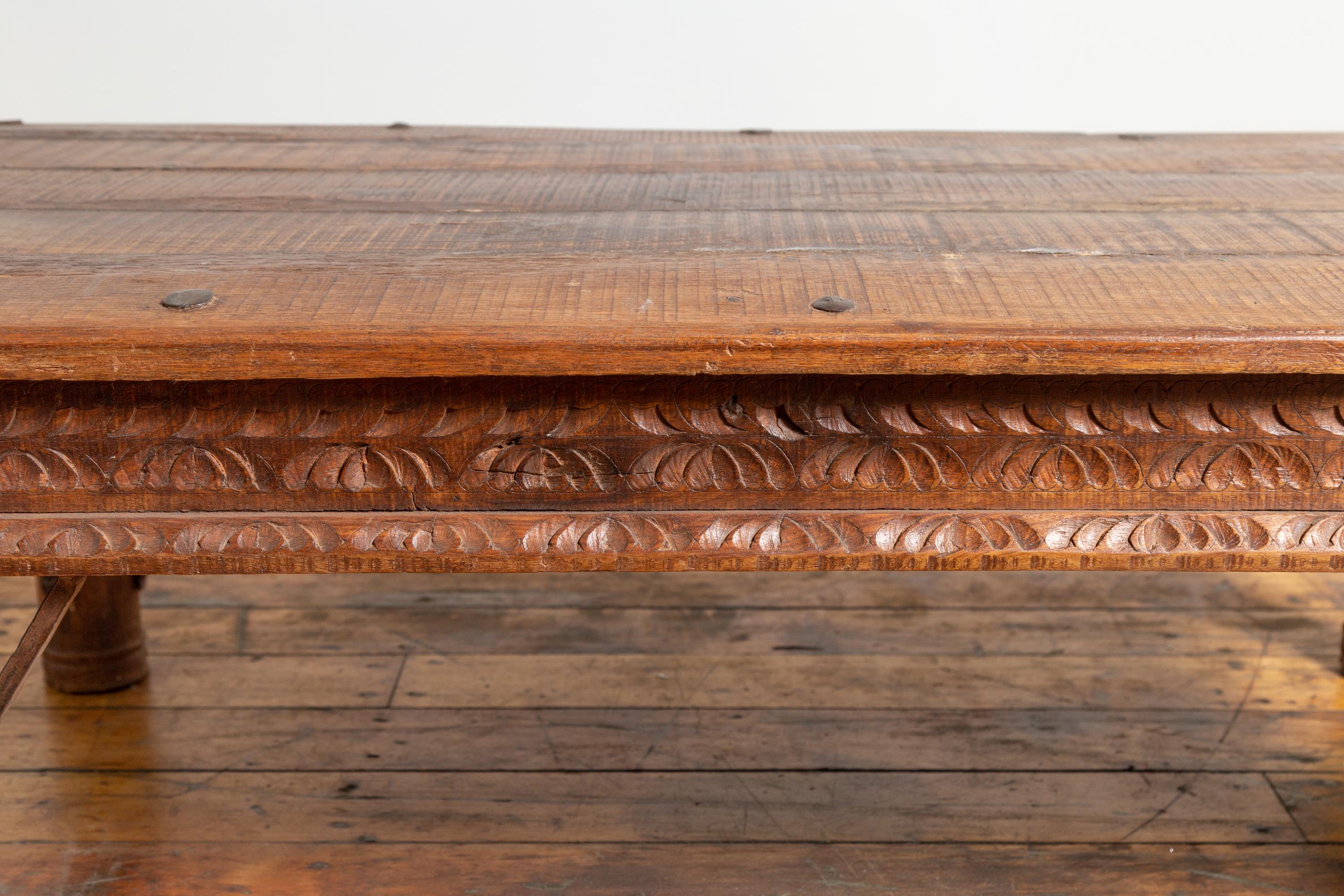 19th Century Indian Rustic Low Coffee Table with Carved Apron and Iron Accents In Good Condition In Yonkers, NY