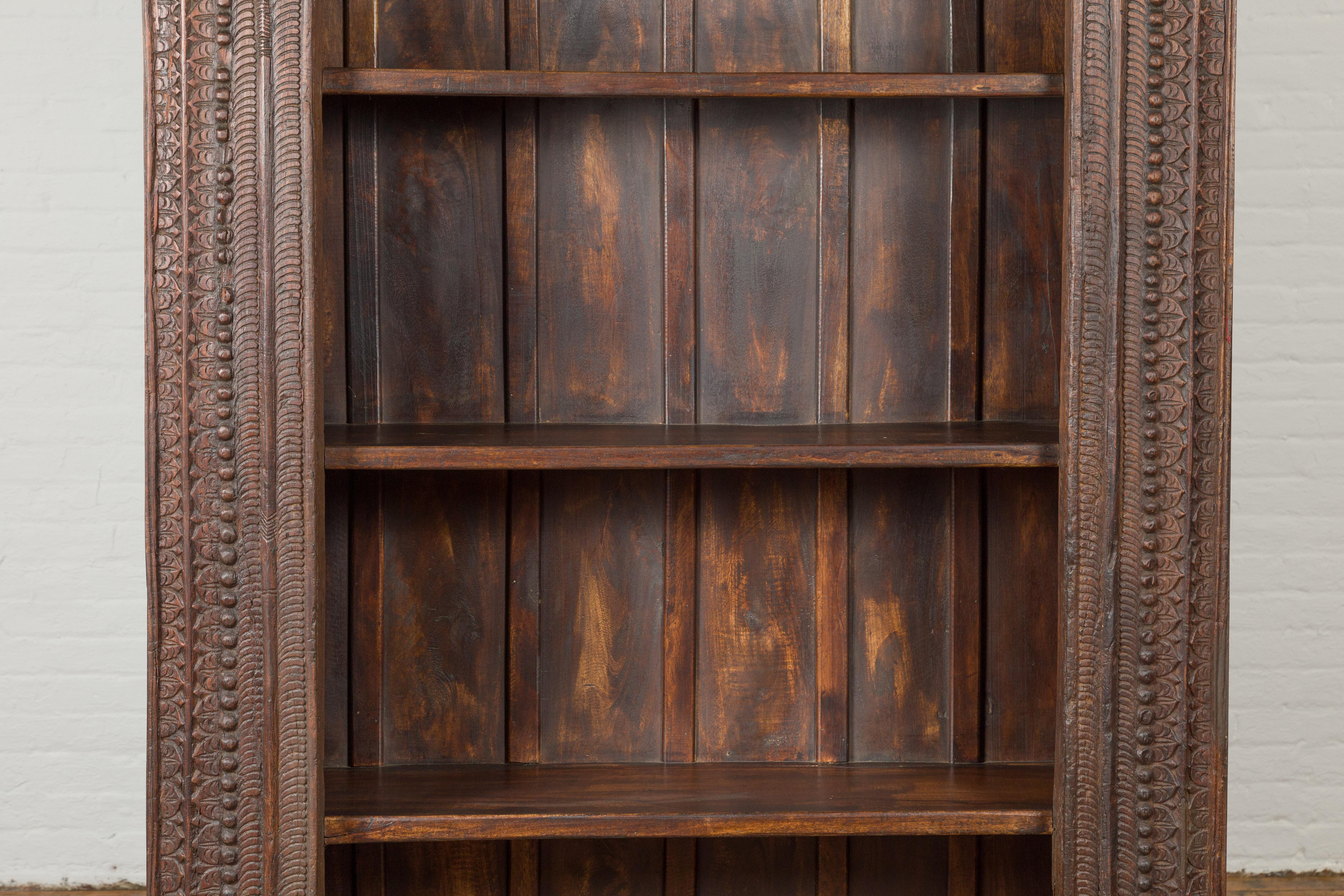 19th Century Indian Wooden Bookcase from Gujarat with Carved Friezes and Rosette In Good Condition For Sale In Yonkers, NY