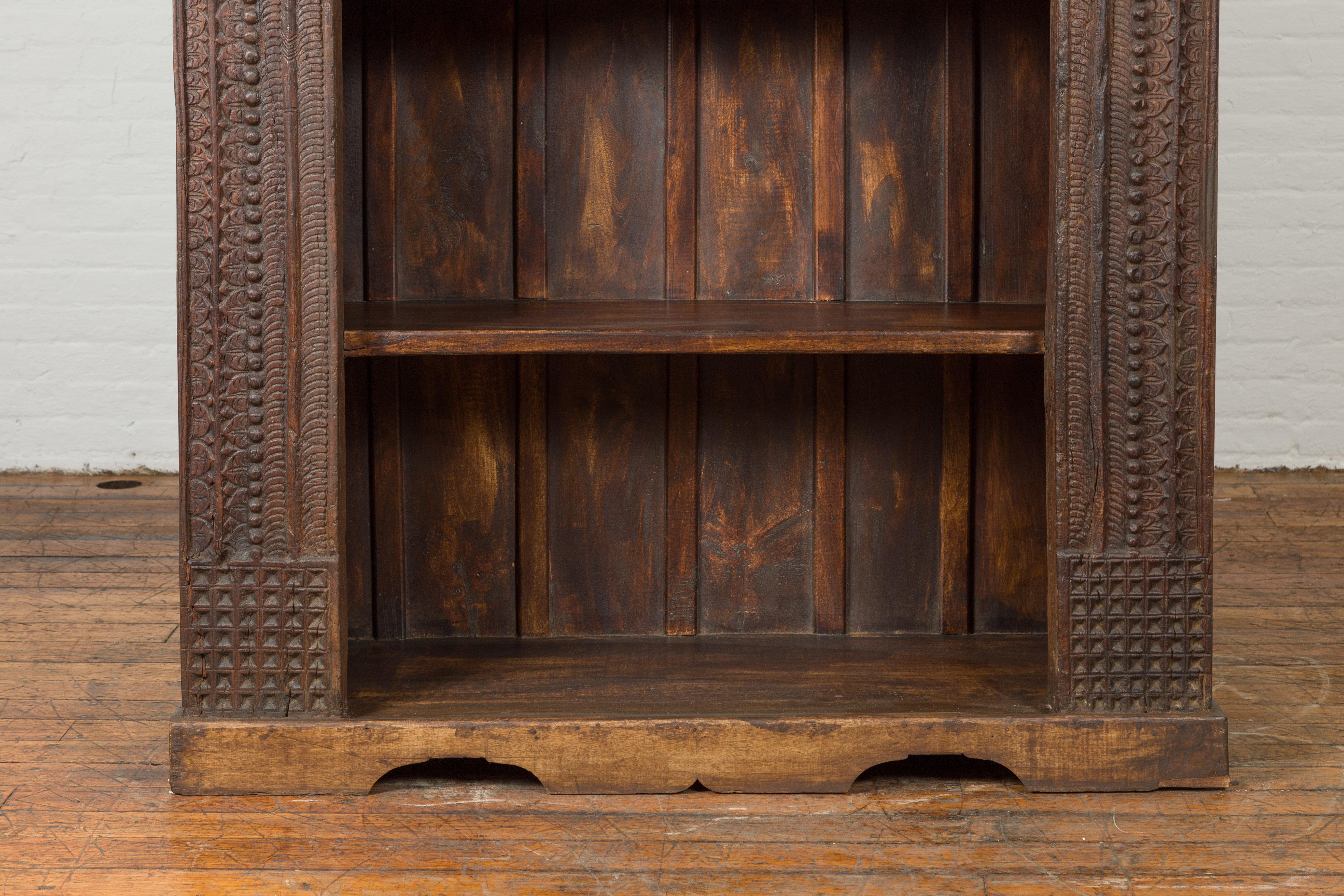19th Century Indian Wooden Bookcase from Gujarat with Carved Friezes and Rosette For Sale 1