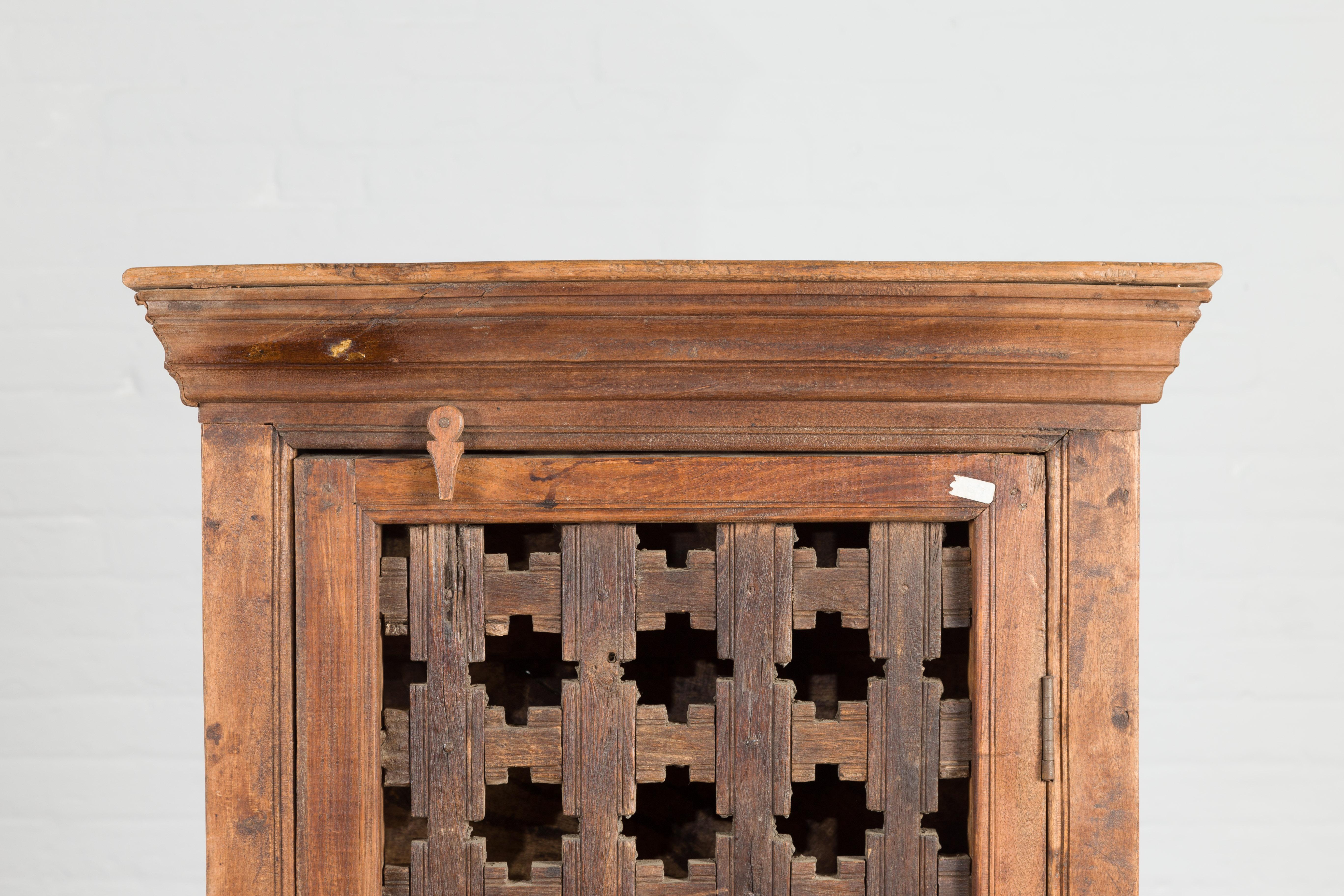 19th Century Indian Wooden Cabinet with Single Fretwork Door and Brass Handle In Good Condition For Sale In Yonkers, NY