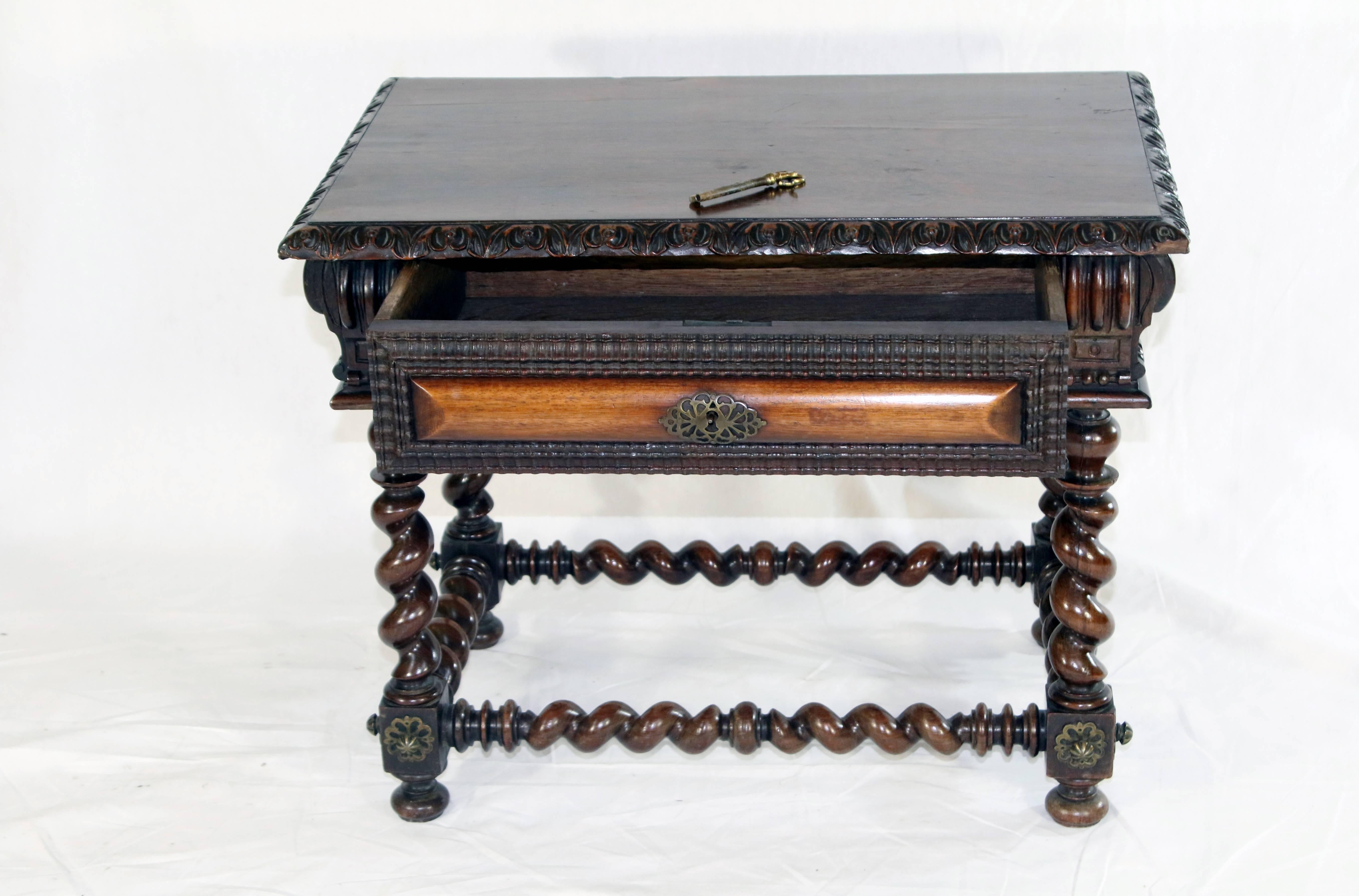 lndo-Portuguese low table with single drawer (key included) made from rare palisander wood (Brazilian rosewood) displaying superb patina and dramatic graining on turned barley twist legs and perimeter stretchers. The single drawer is cleverly