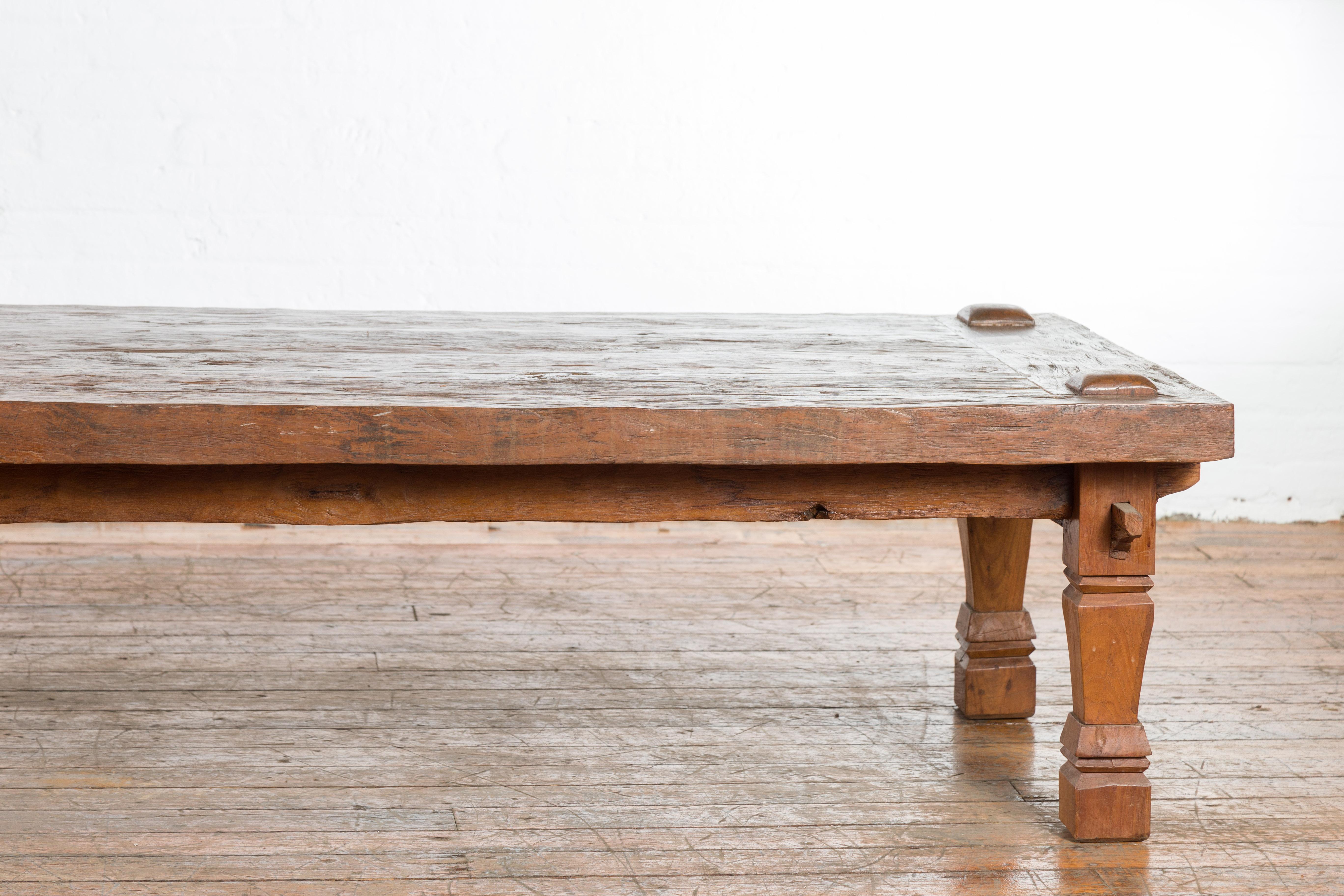 Wood 19th Century Indonesian Madurese Coffee Table with Carved Legs and Raised Joints