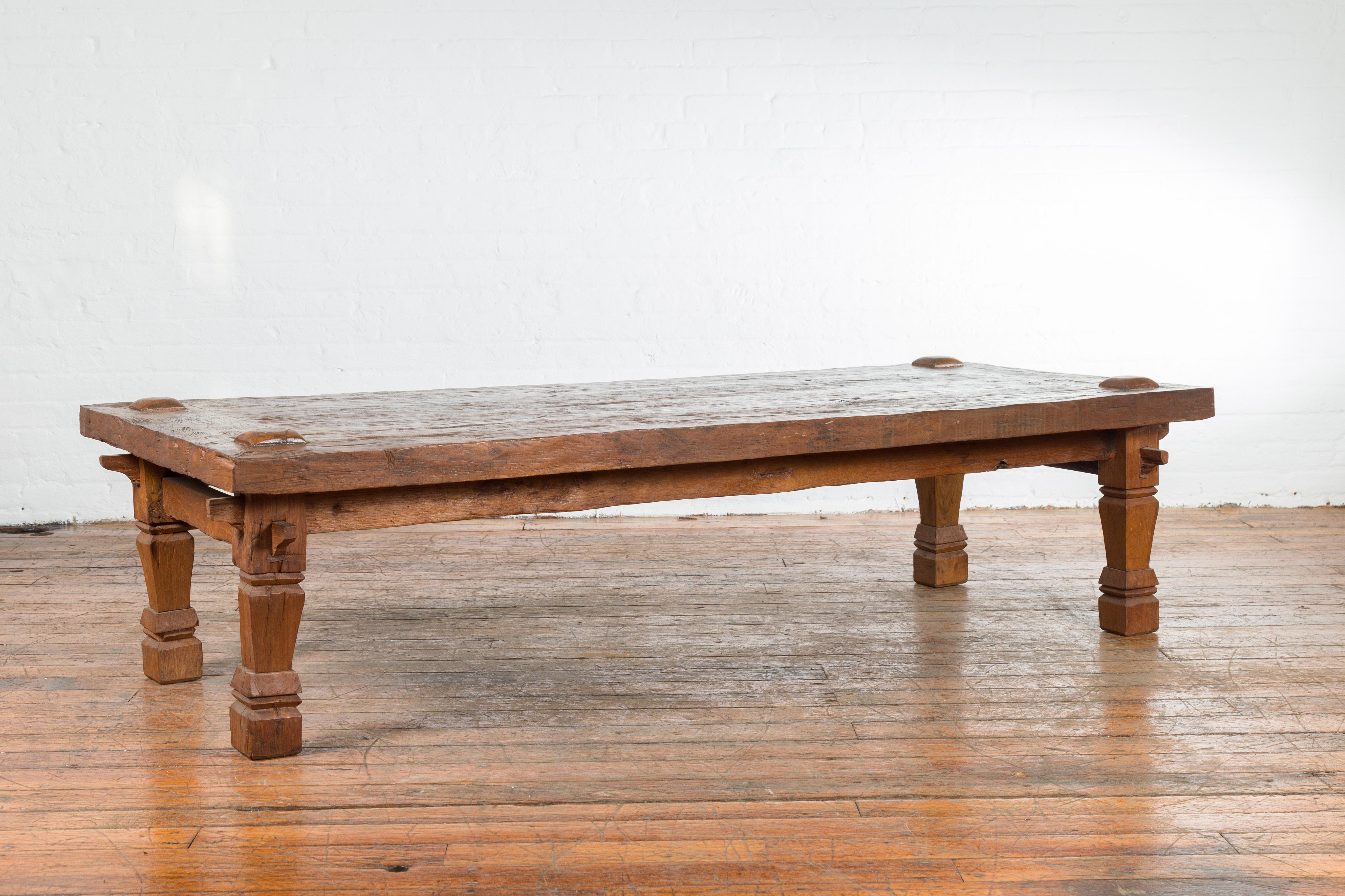 19th Century Indonesian Madurese Coffee Table with Carved Legs and Raised Joints For Sale 1