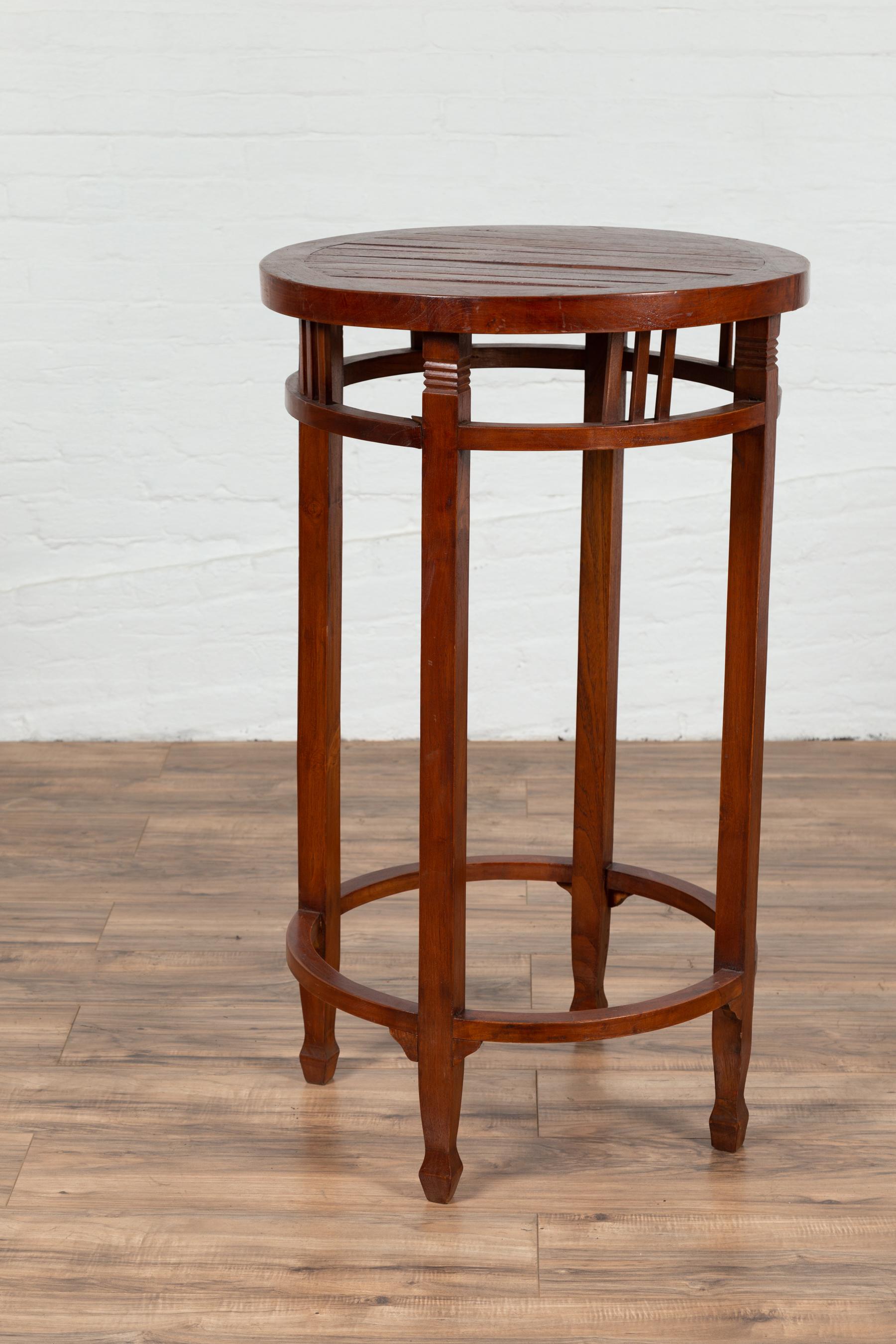 19th Century Indonesian Round Pedestal Table with Pierced Apron and Stretchers For Sale 4