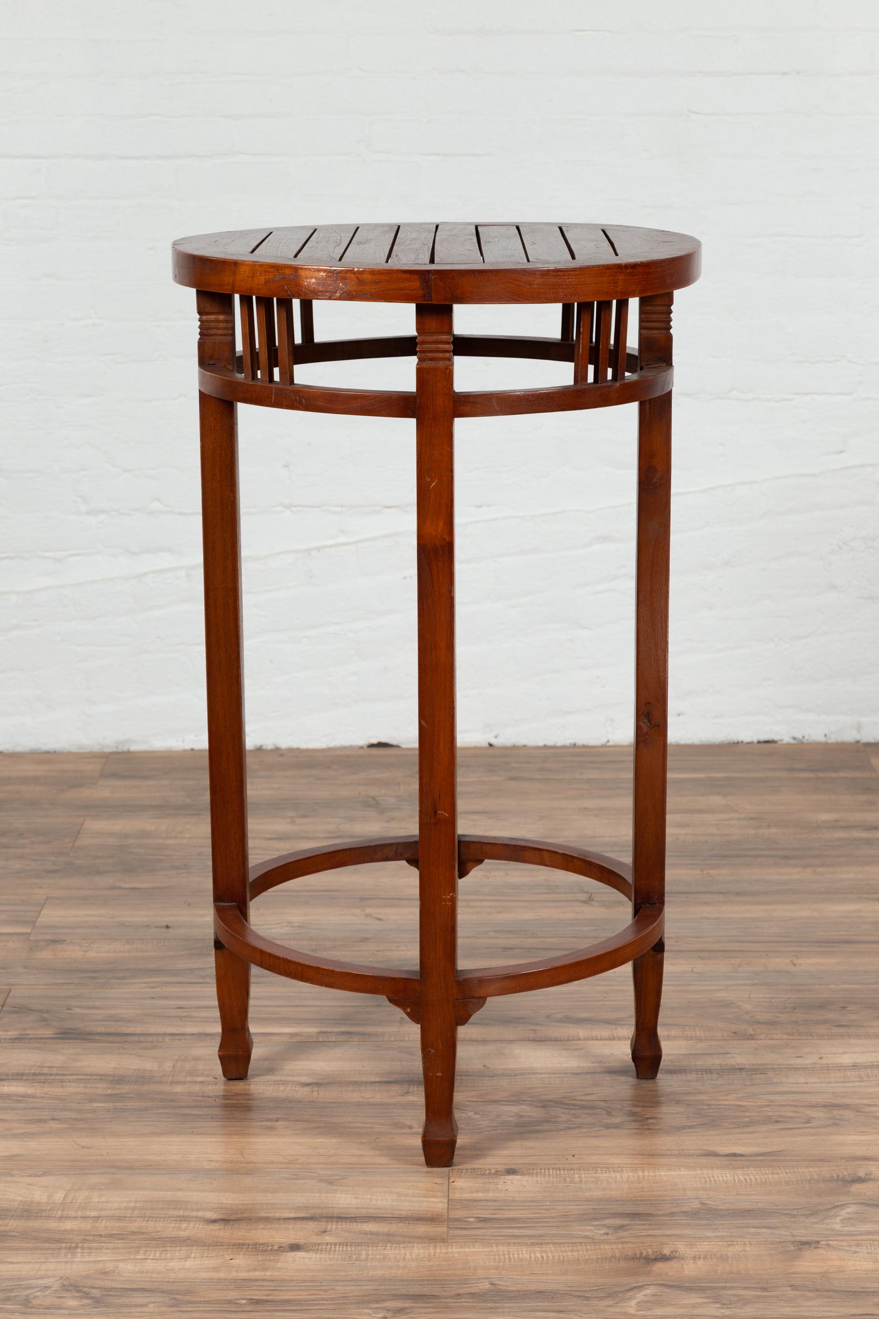 19th Century Indonesian Round Pedestal Table with Pierced Apron and Stretchers For Sale 5