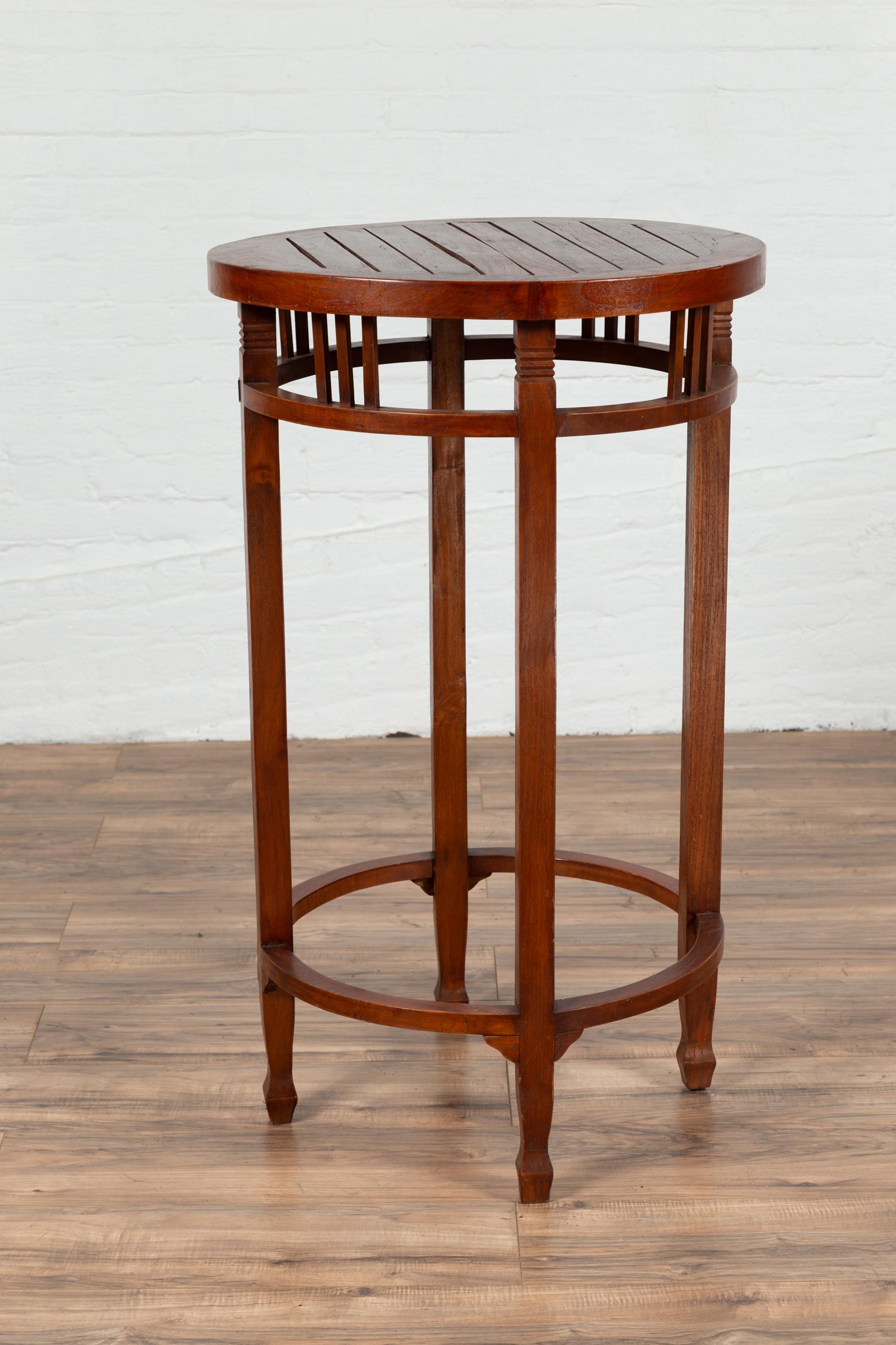 19th Century Indonesian Round Pedestal Table with Pierced Apron and Stretchers For Sale 3