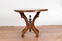 19th Century Indonesian Round Top Table with Turned Finial and Scrolling Legs