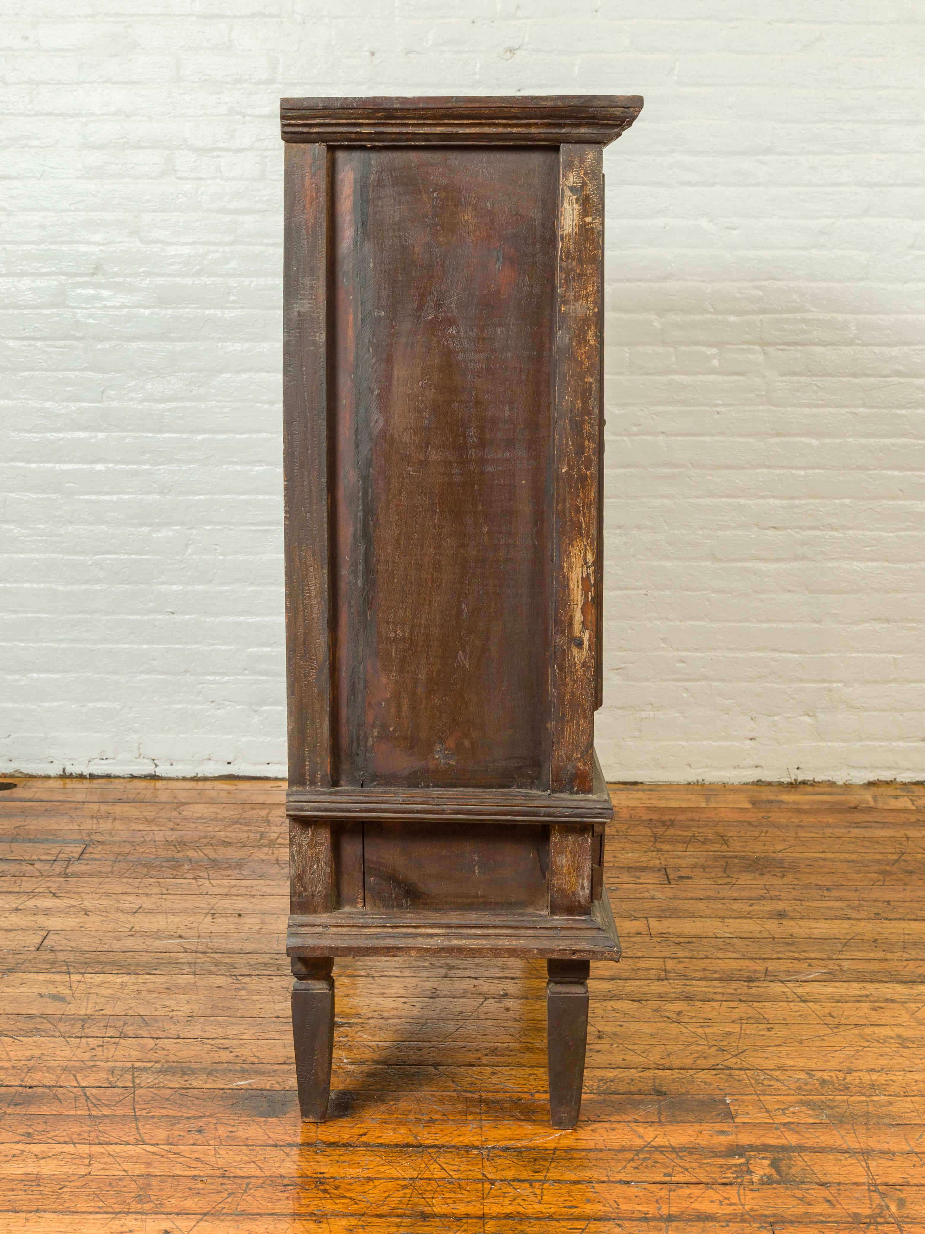 19th Century Indonesian Wooden Cabinet with Doors, Drawers and Carved Medallions For Sale 5