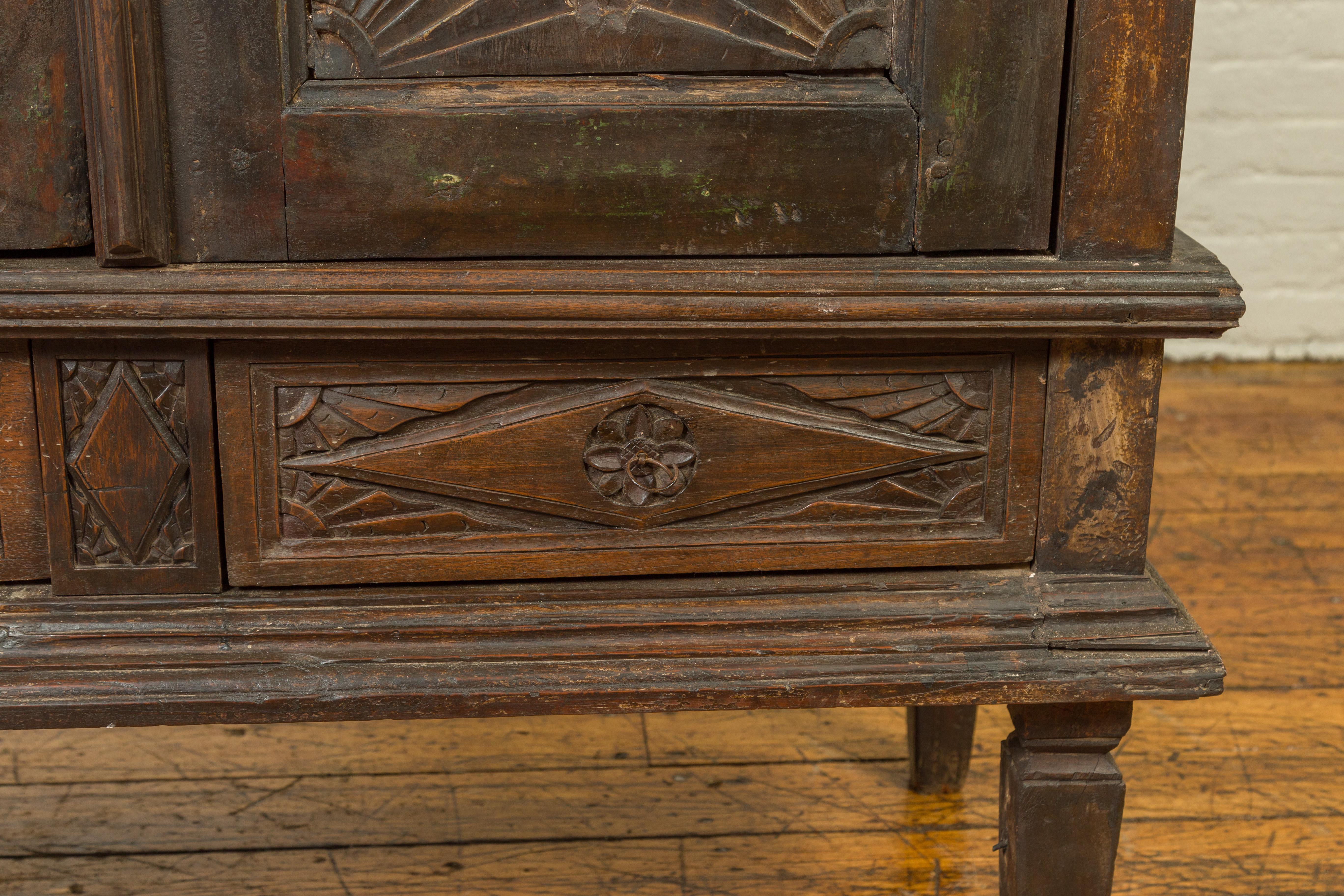 19th Century Indonesian Wooden Cabinet with Doors, Drawers and Carved Medallions For Sale 3