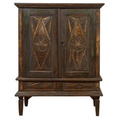 19th Century Indonesian Wooden Cabinet with Doors, Drawers and Carved Medallions