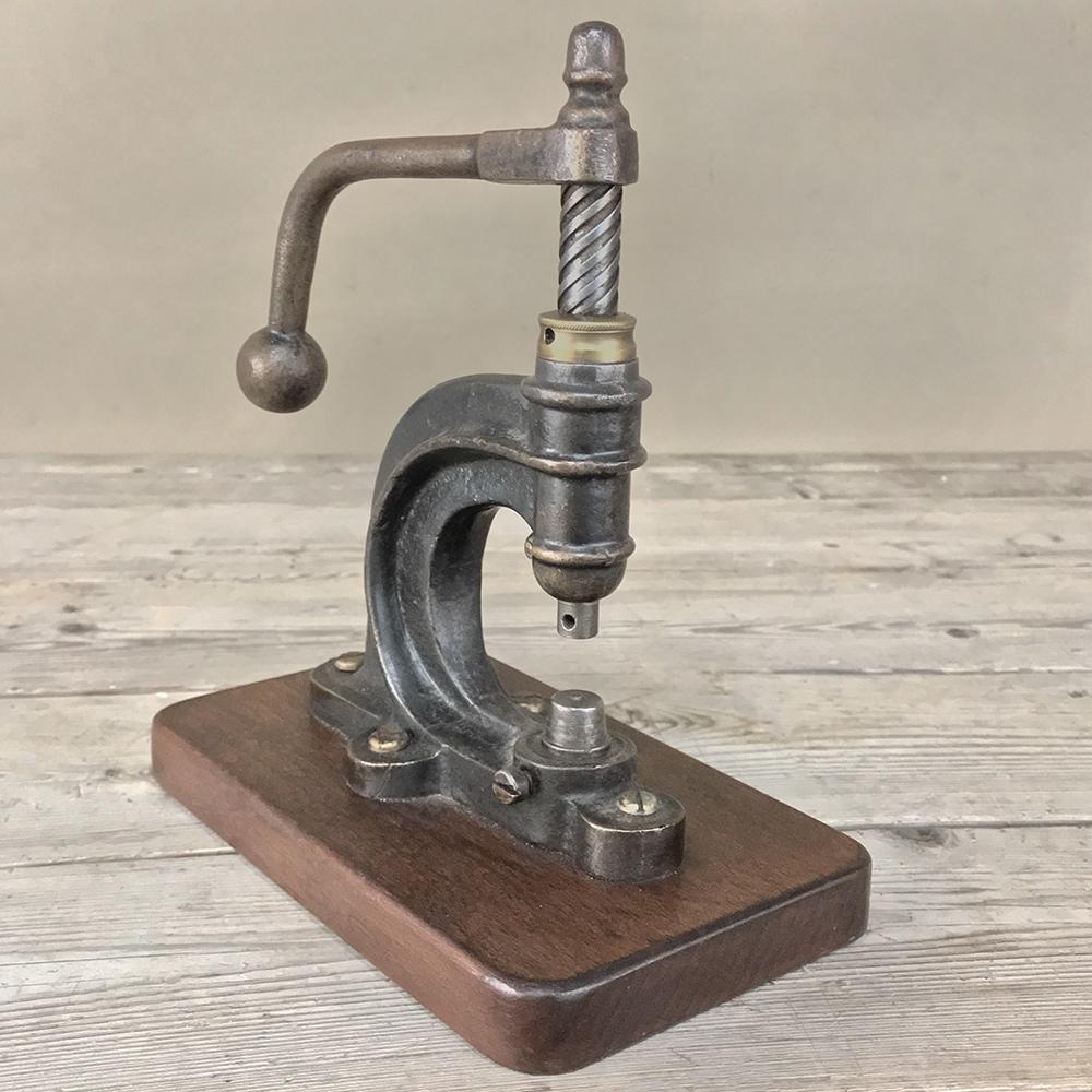 antique button press