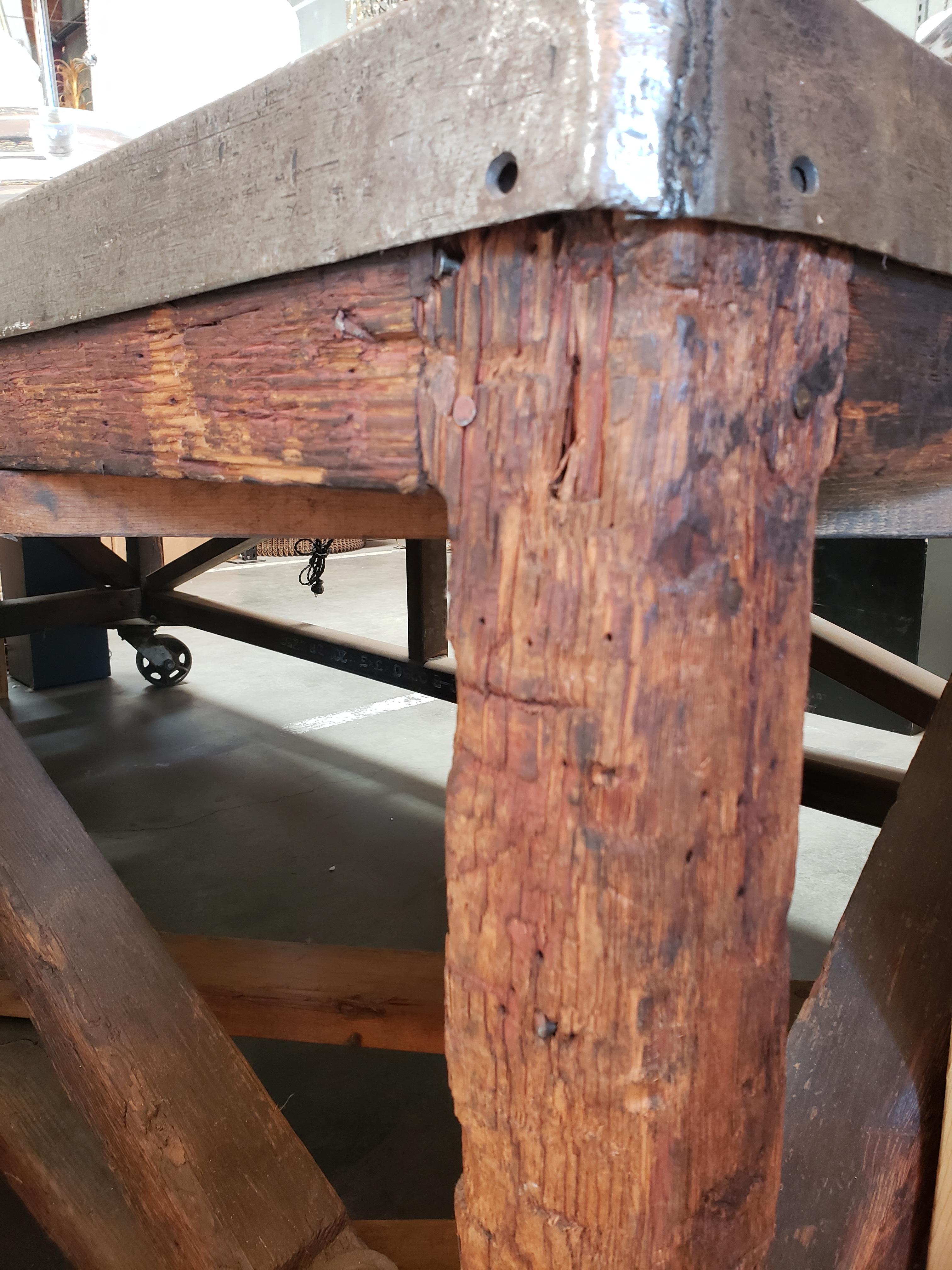 19th Century Industrial Steel Encased Redwood Wheeled Table 7