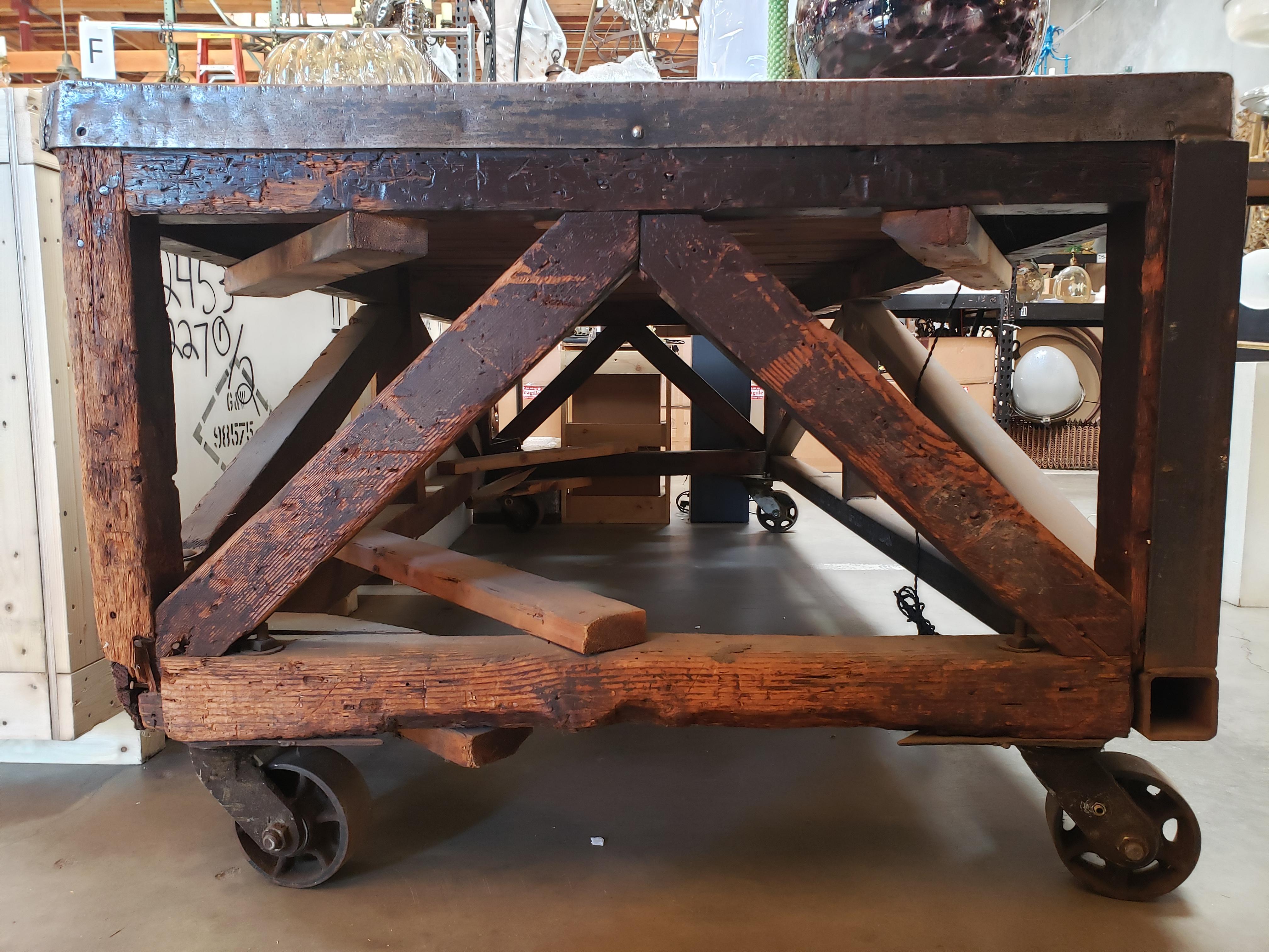 19th Century Industrial Steel Encased Redwood Wheeled Table 8