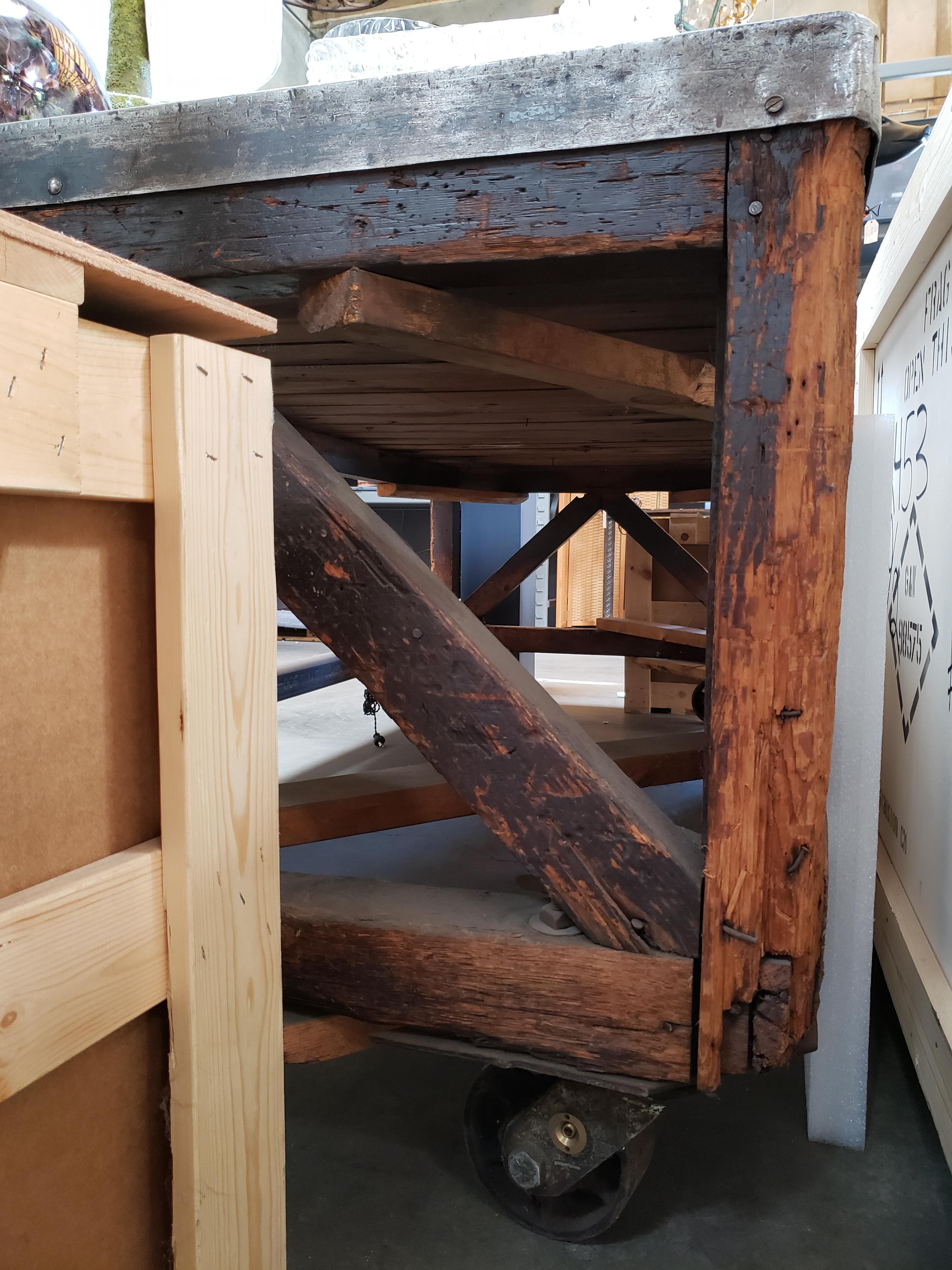 19th Century Industrial Steel Encased Redwood Wheeled Table 9