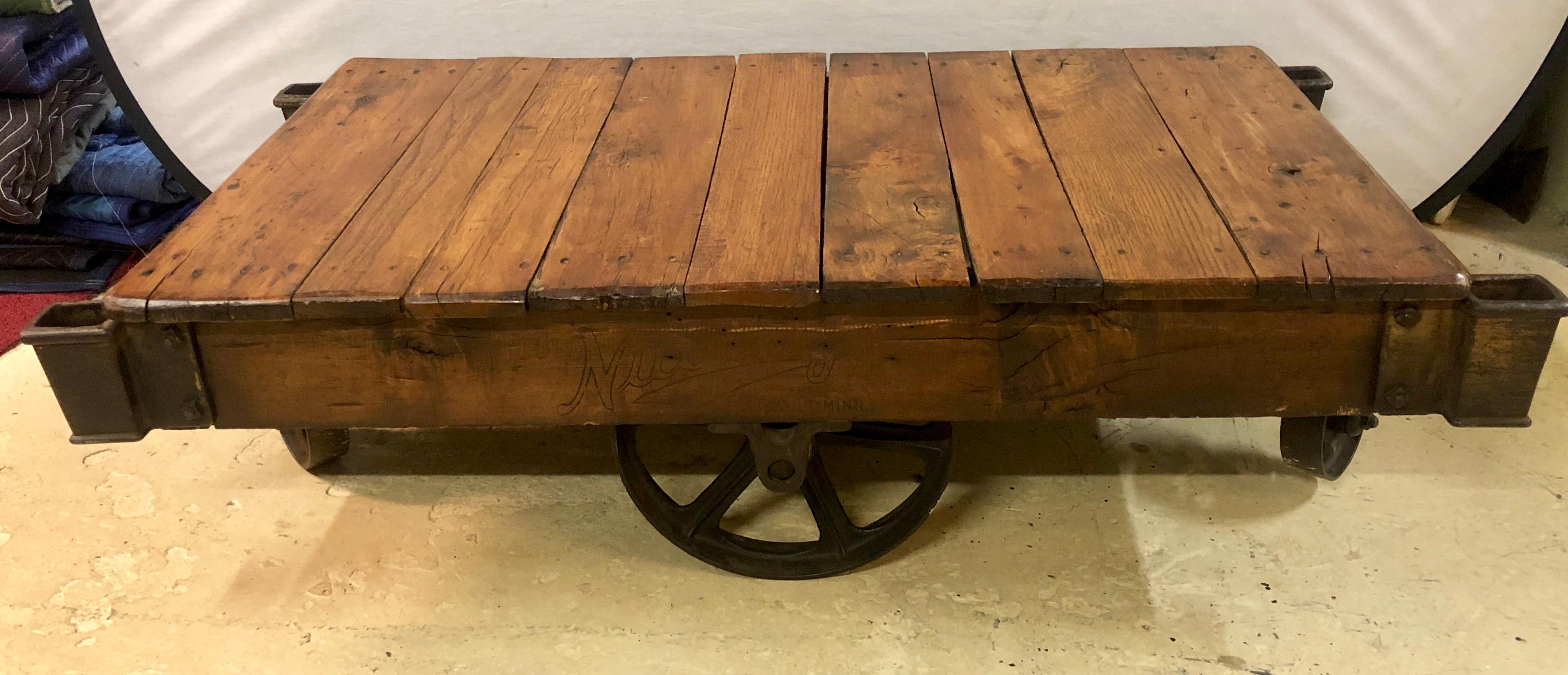 19th century industrial wheeled trolley coffee table stamped Fairbanks Minn. 

Lia.
