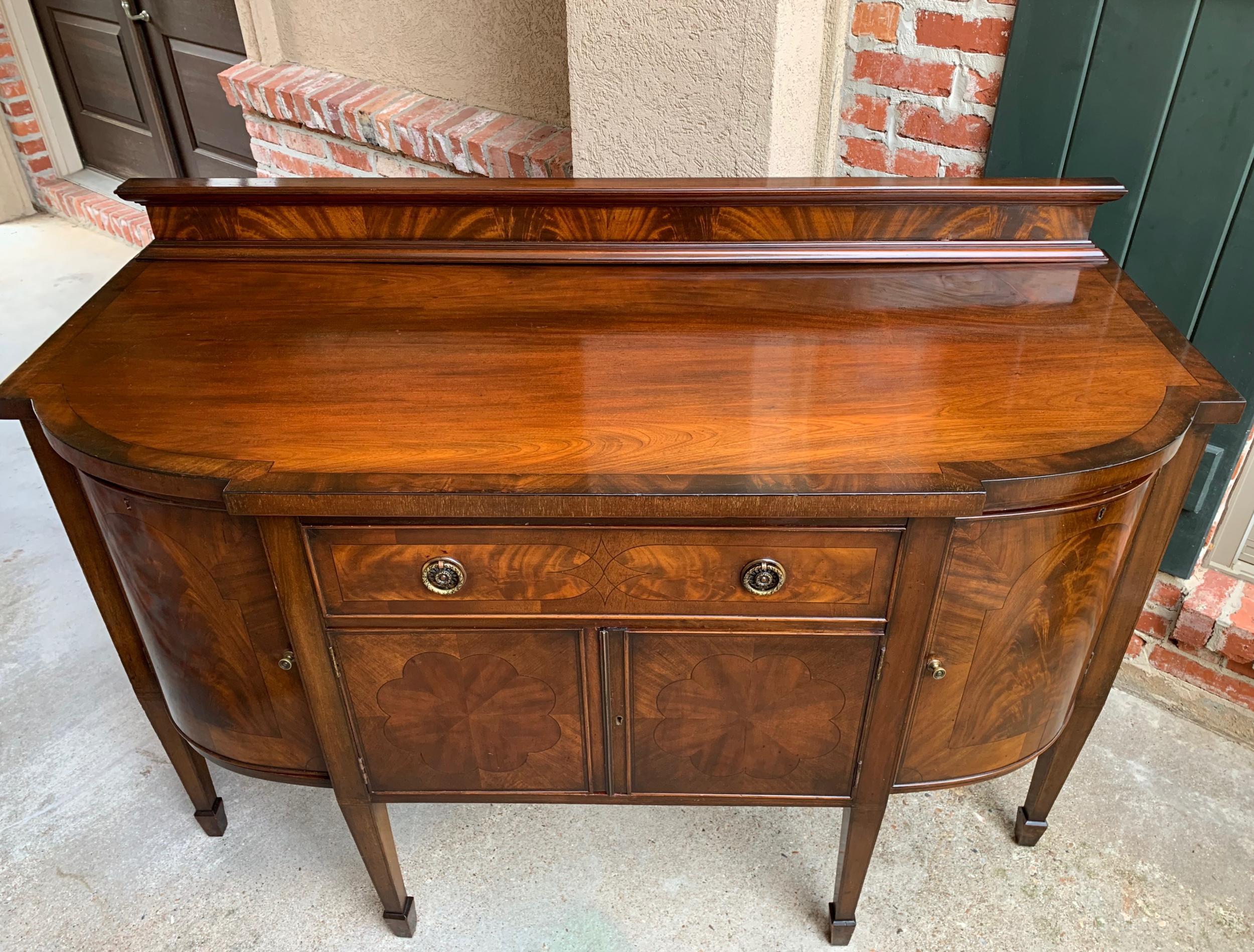 19th century inlaid flame mahogany sideboard buffet Hepplewhite Sheraton style

~From an antique dealer’s personal collection, this lovely antique Hepplewhite style mahogany sideboard~
~Block fronted with bow sides, having gorgeous inlaid and