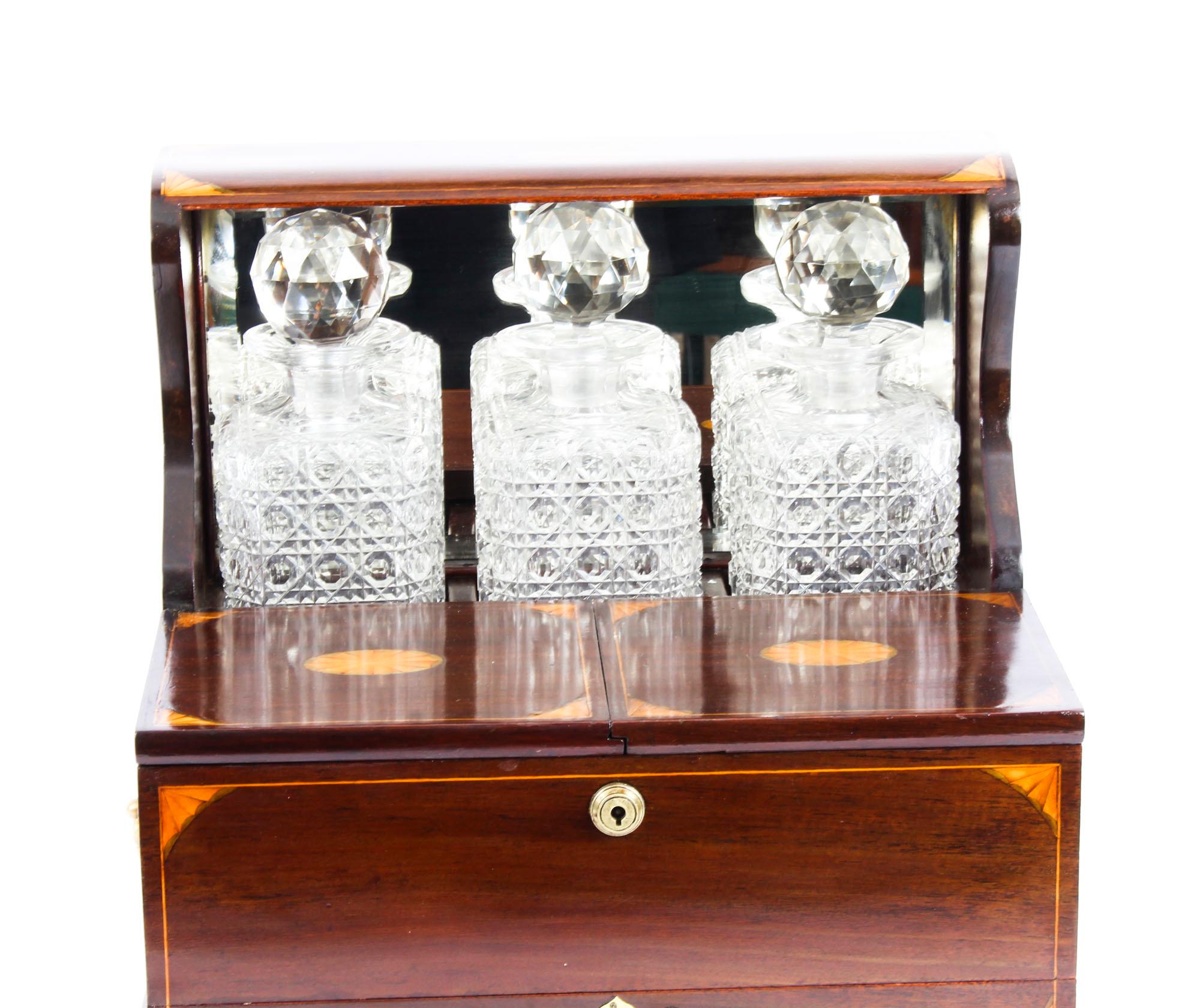English 19th Century Inlaid Flame Mahogany Three Crystal Decanter Tantalus