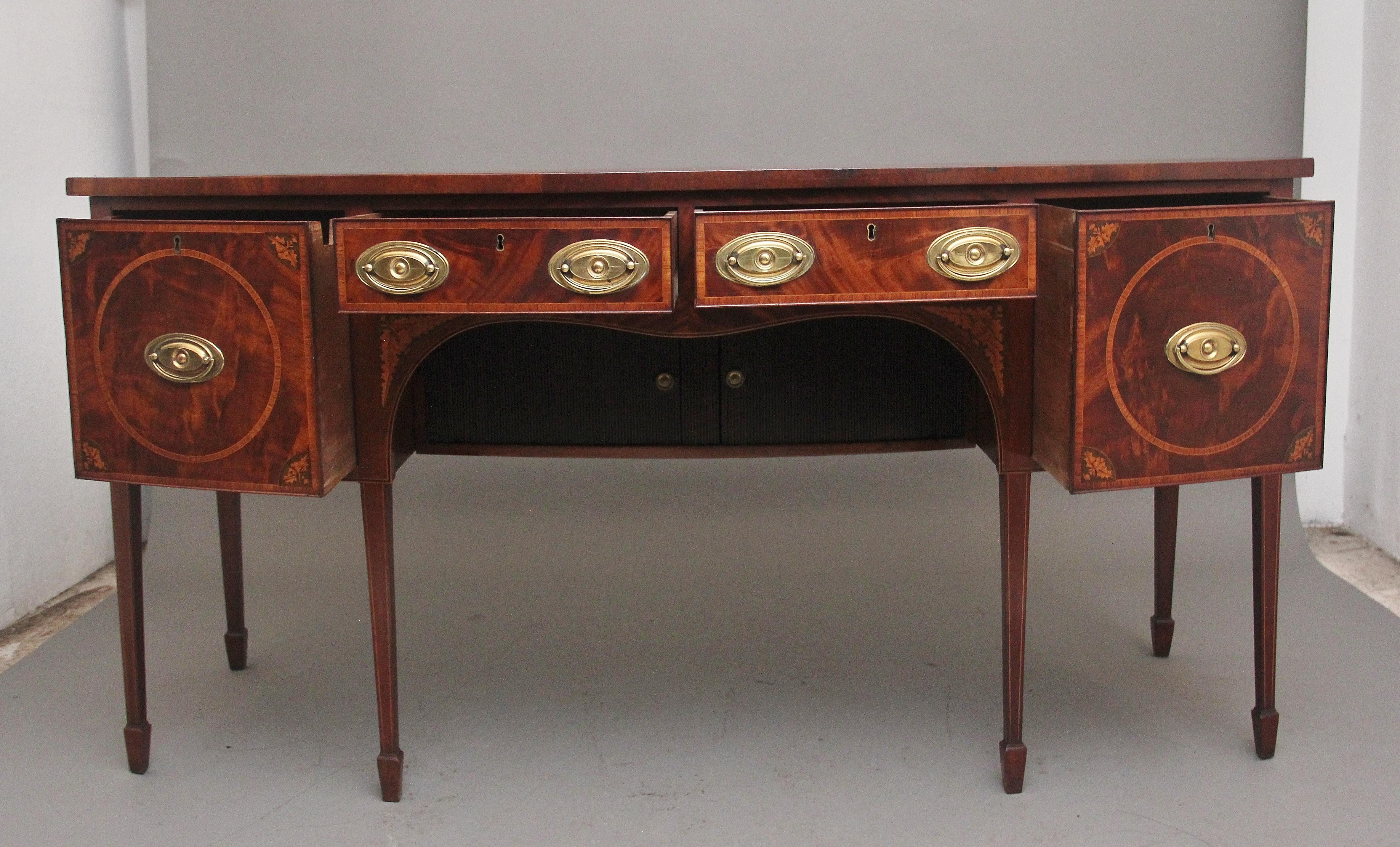 A lovely quality early 19th Century inlaid mahogany bowfront sideboard, having a lovely figured top with crossbanding around the edge, below the top there are two central drawers and two deep drawers either side, all drawers are oak lined and having