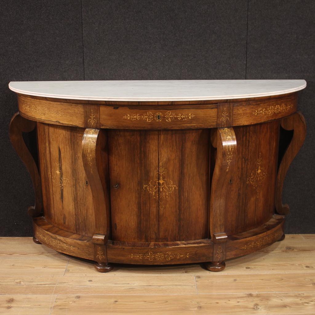 French sideboard from the first half of the 19th century. Charles X cabinet finely inlaid in high quality walnut, rosewood and maple. Original white marble top of excellent size and service. Sideboard with three doors and a central drawer of good