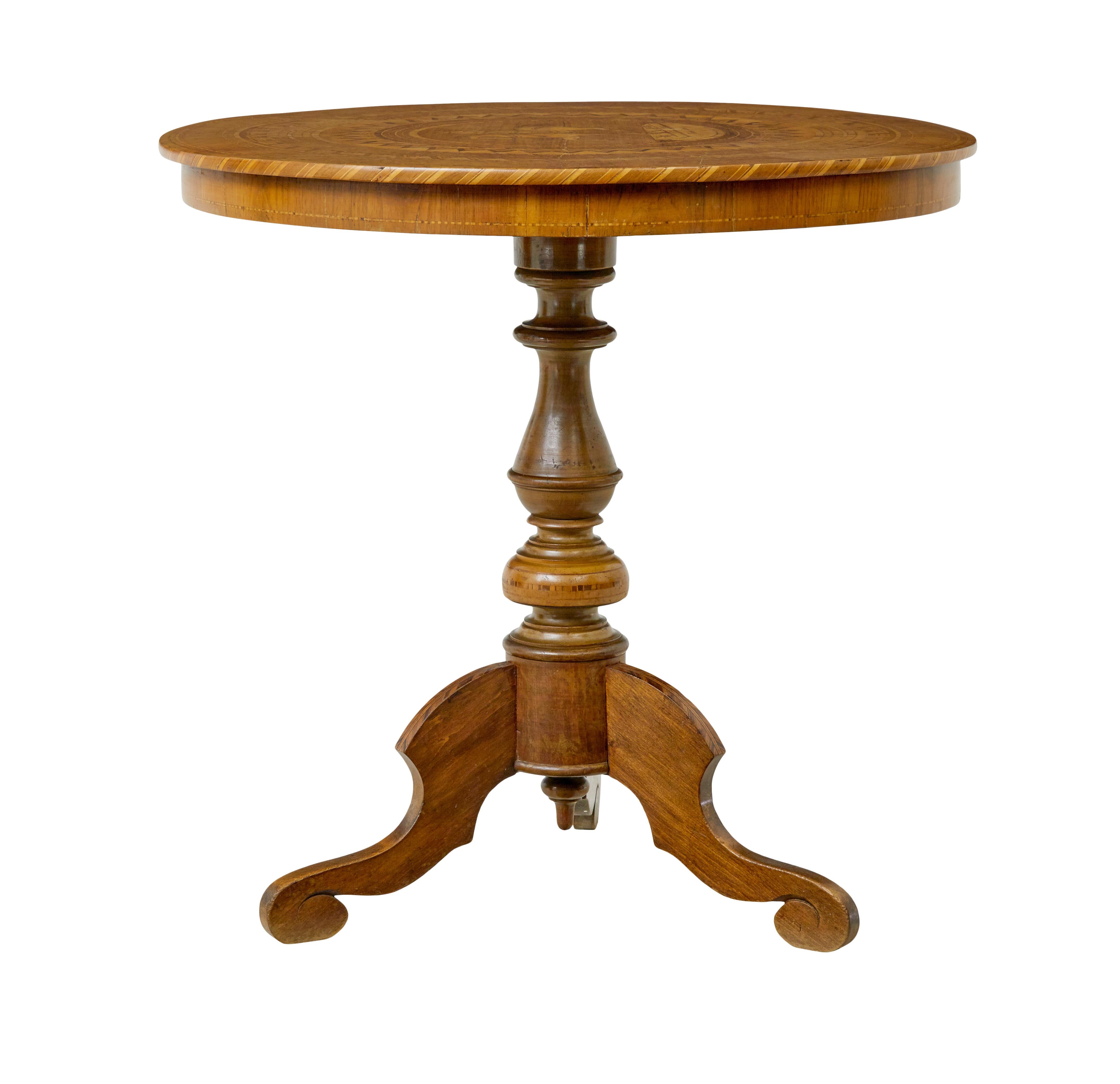 19th century inlaid walnut sorrento table circa 1890.

Fine quality sorrento table depicting joan of arc in the centre.

Circular top with symmetrical patterns, stringing and salt and pepper inlay, completed by a central jeanne d'arc figure mounted