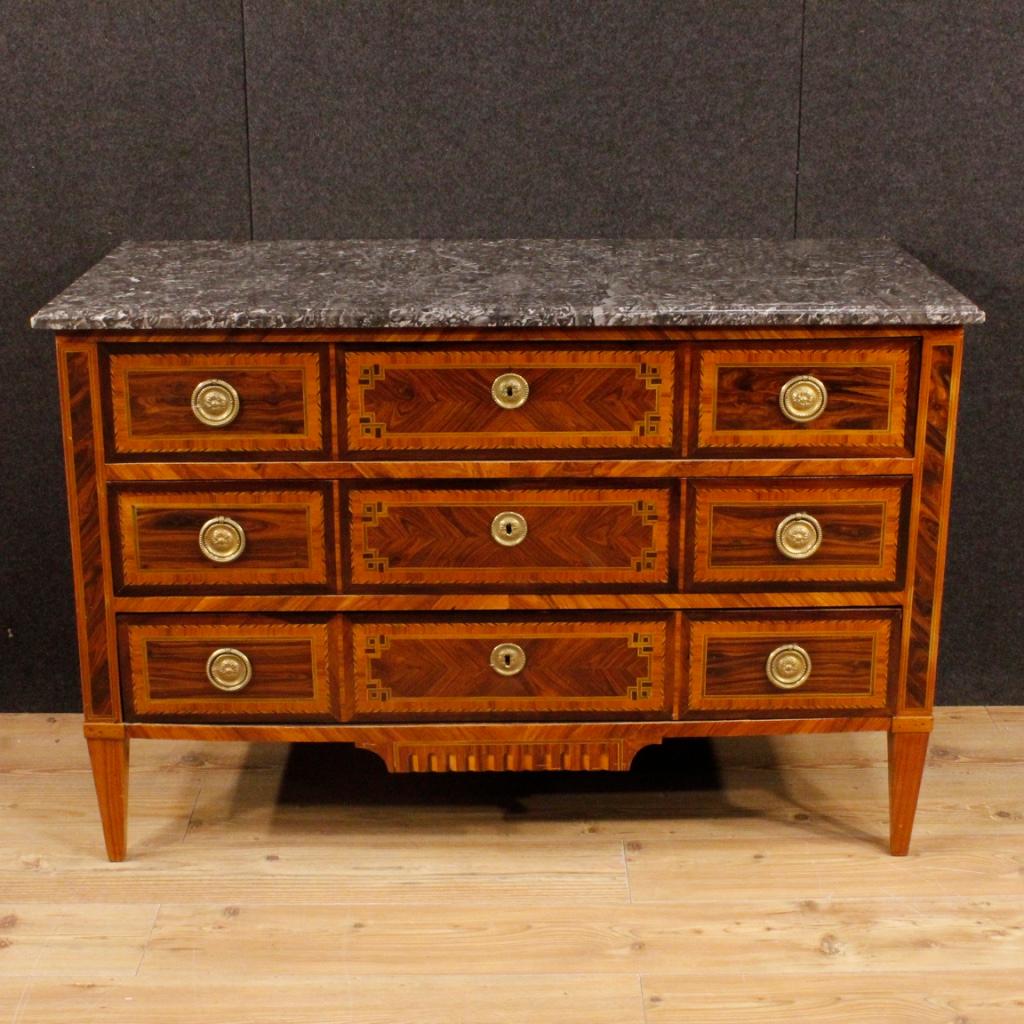 French dresser from the second half of the 19th century. Louis XVI style furniture of great elegance inlaid in woods of rosewood, walnut, violet, tulipwood, mahogany, palisander and fruitwood. Commode with three external drawers adorned handles in