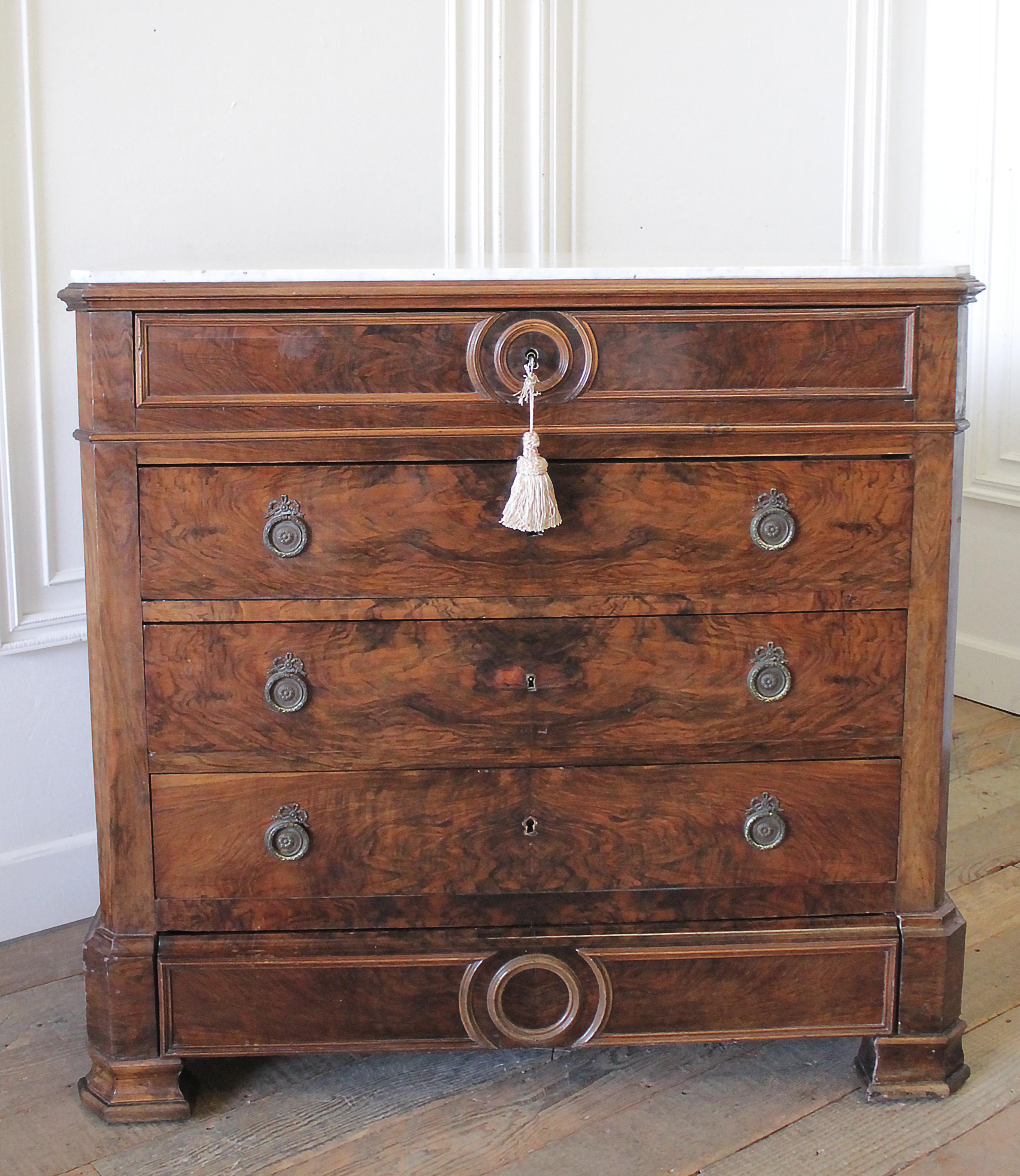 19th century inlay Empire style chest of drawers with marble top
working locking original key. Drawers open and close with ease. Five drawers total.
Some minor scratches present. The marble is original, has markings. 
Measures: 42.5