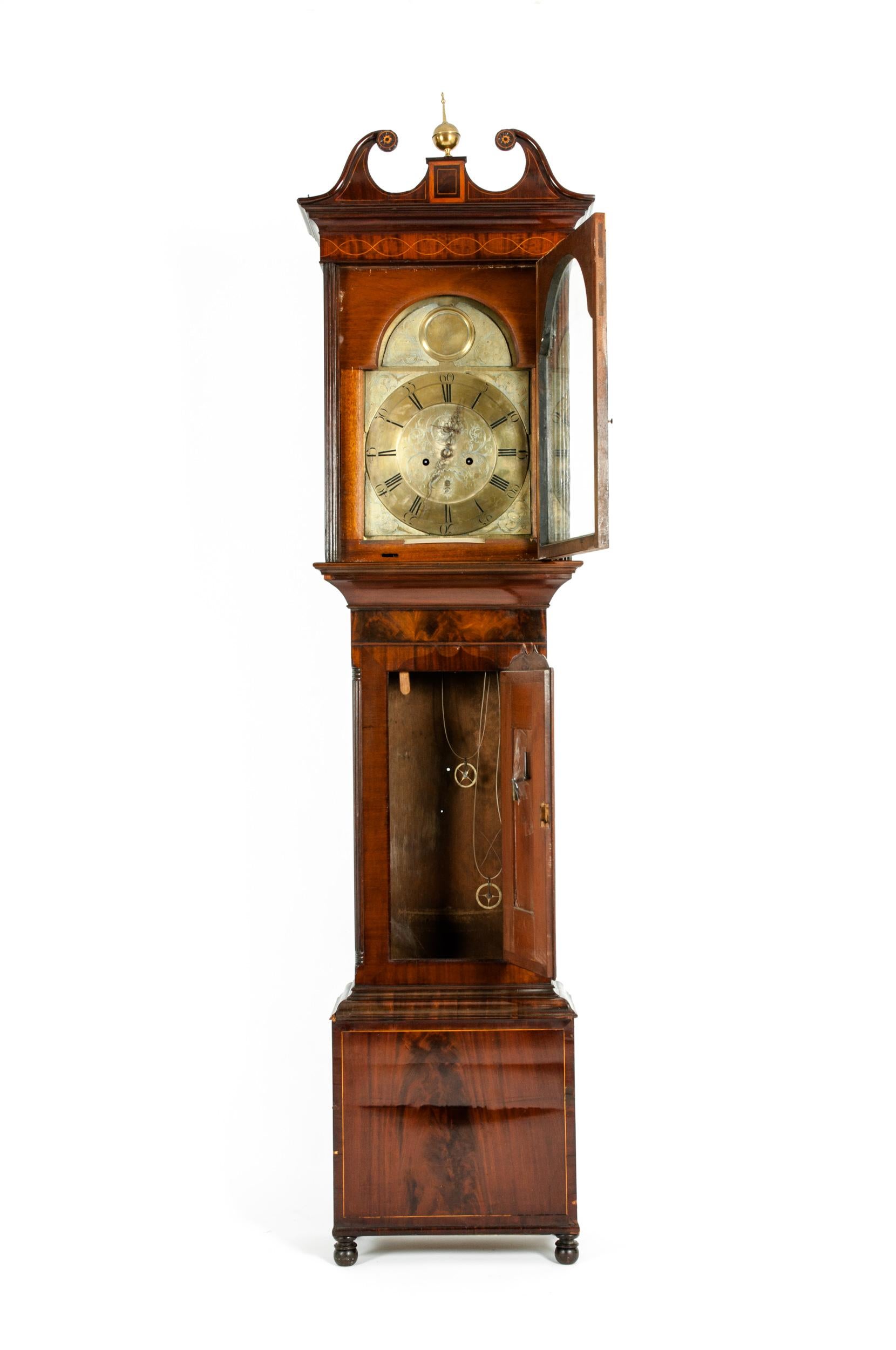 Mid-18th century J Kinnear inlay mahogany wood case long case clock with bronze mount details. The case clock is in good antique condition . Minor wear appropriate consistent with age / use. Top left finial have been repaired . The clock is signed
