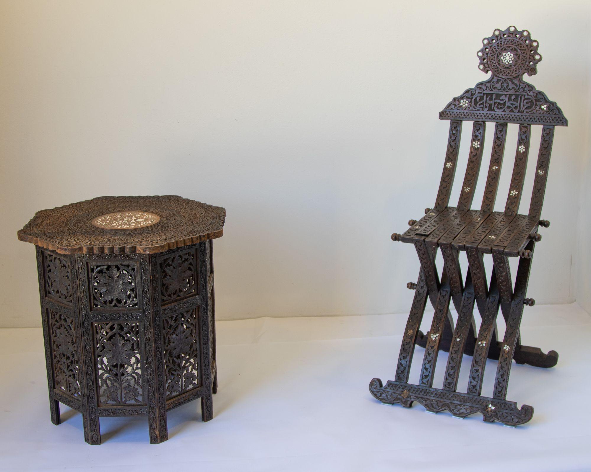 19th Century intricately carved Anglo-Indian octagonal scalloped edge side table.
A beautiful finely carved British Colonial wooden occasional side table from India.
Antique fine quality pierced and profusely carved Anglo-Indian occasional table