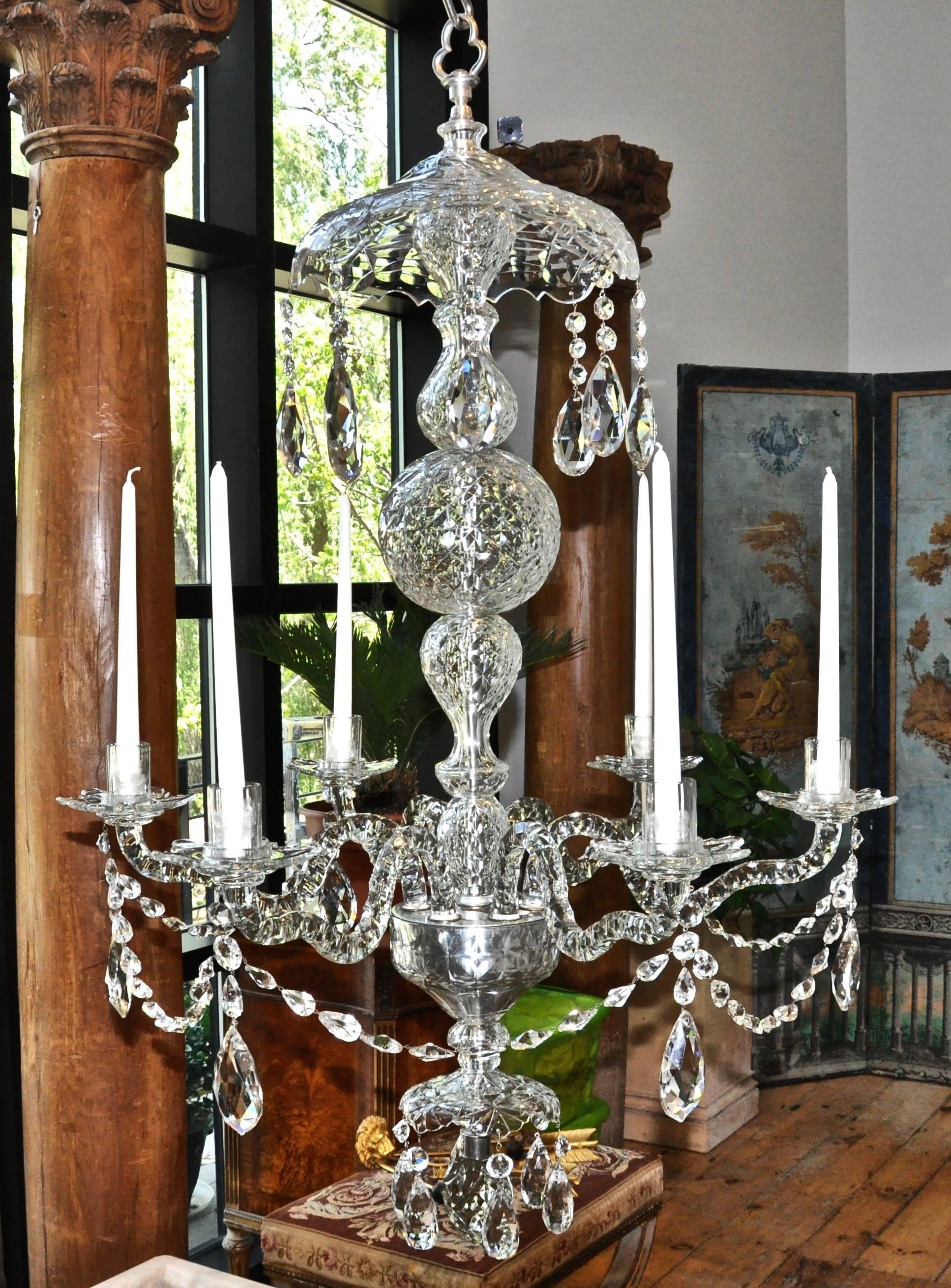 Irish cut-crystal chandelier of the Waterford area in Georgian style

- Early to mid-19th century
- Silvered brass fittings
- Exquisite cut and design
- In very good condition
- Now with candles but can be French wired at customer's