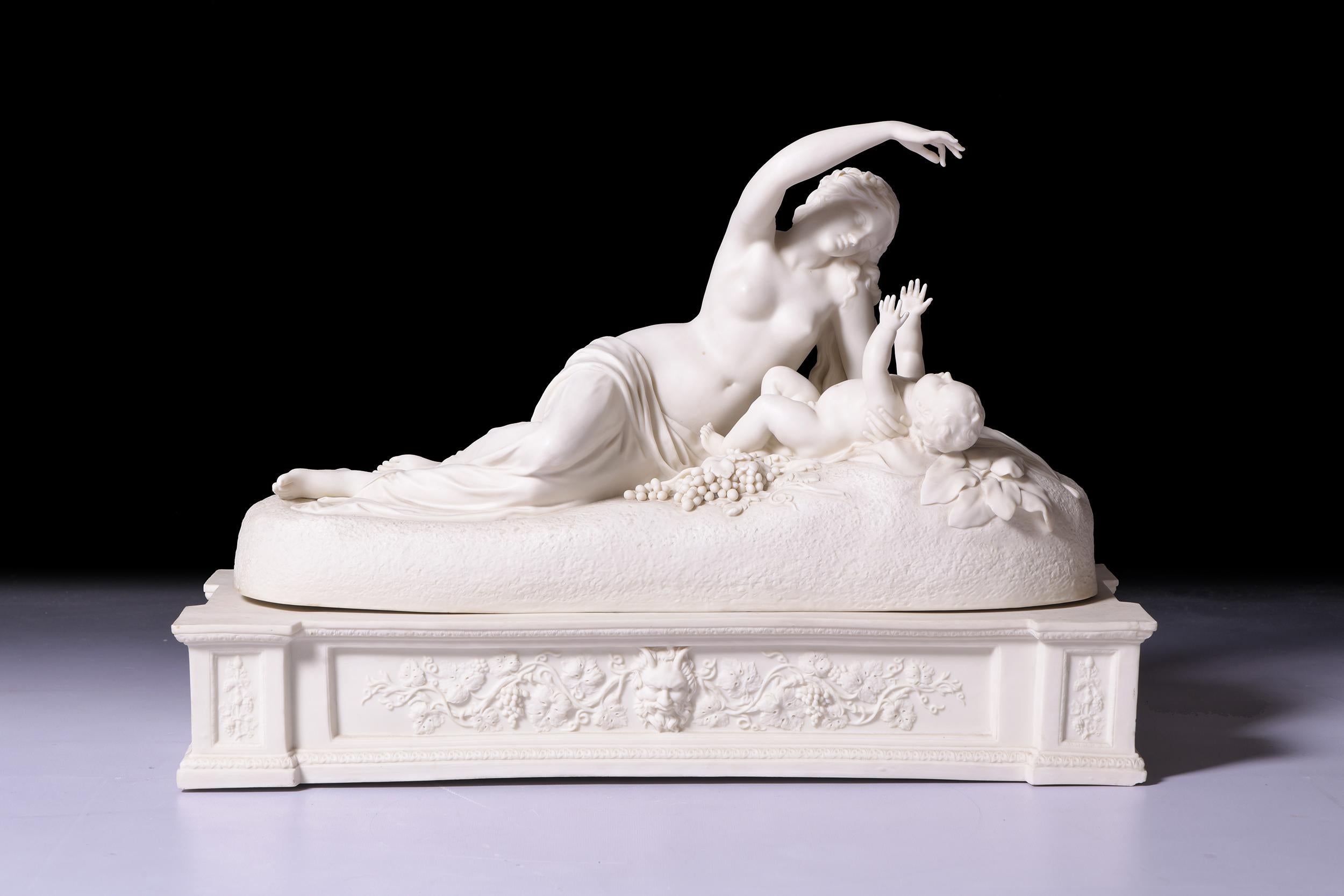 An exceptional 19th century Parian figure group of The Infant Bacchus and Ino of a recumbent naked girl playing with an infant by Irish Sculpture John Henry Foley. Note: Ino & Bacchus was Foley's entry for The Royal Academy in 1840 and confirmed his