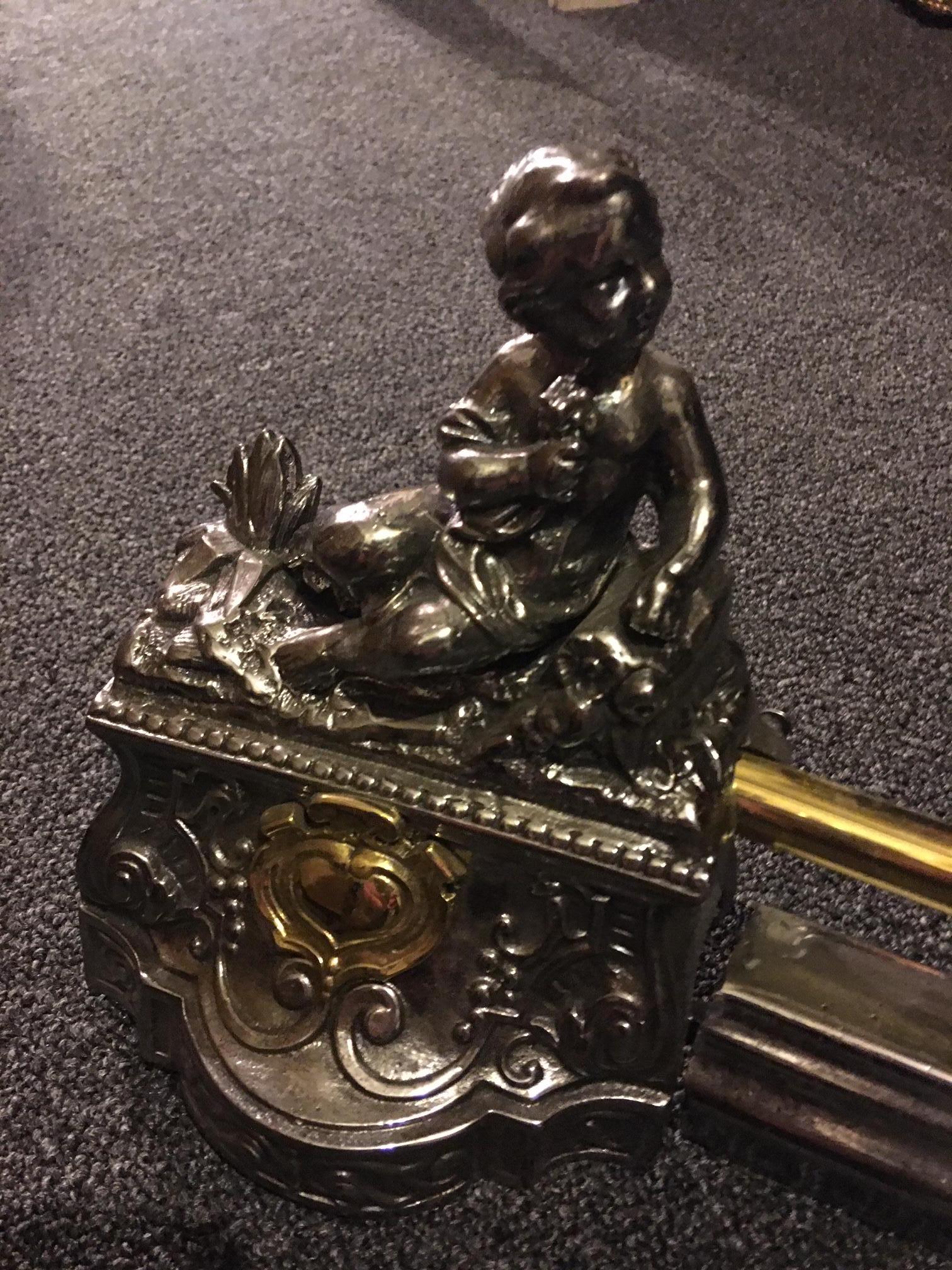 19th Century Iron and Brass Fire Bar Adorned with Cherubs For Sale 2