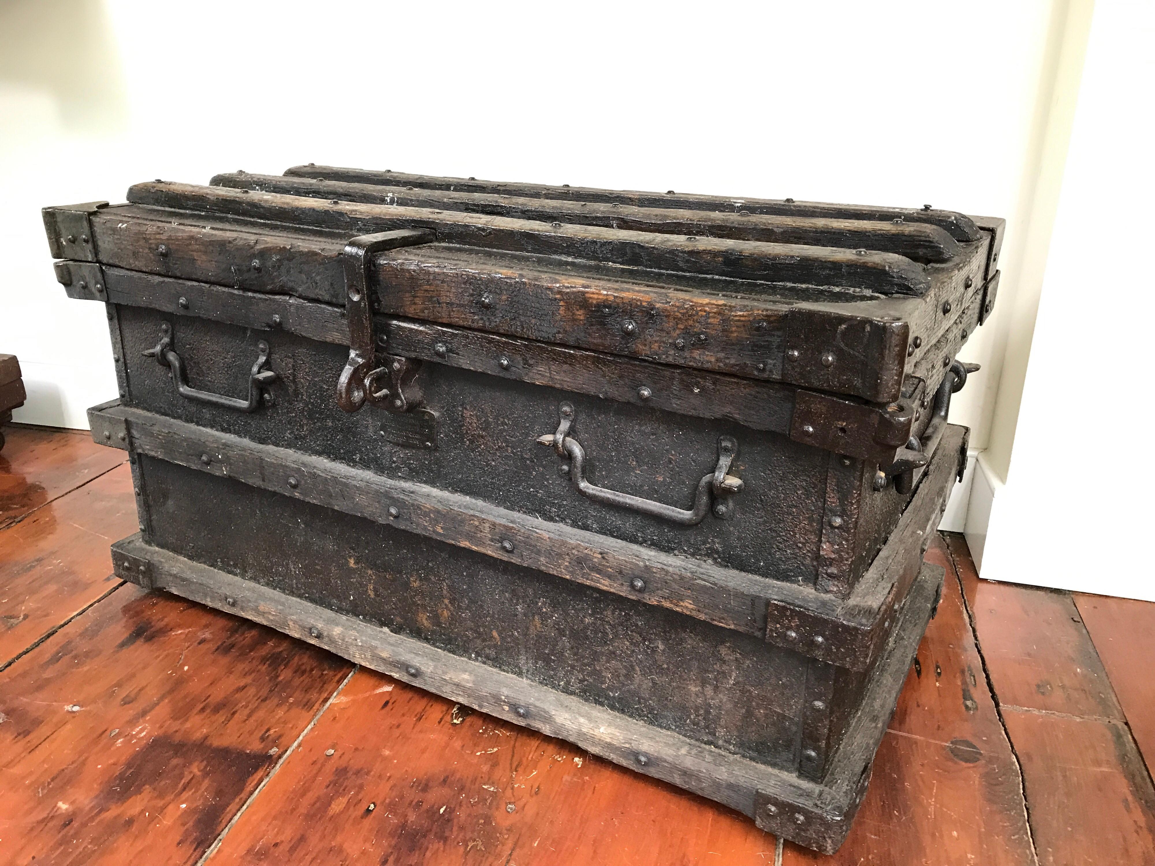 A 19th century iron and wood chest by Vanderman. Made in USA. Iron and wood body with handwrought handles and lock.