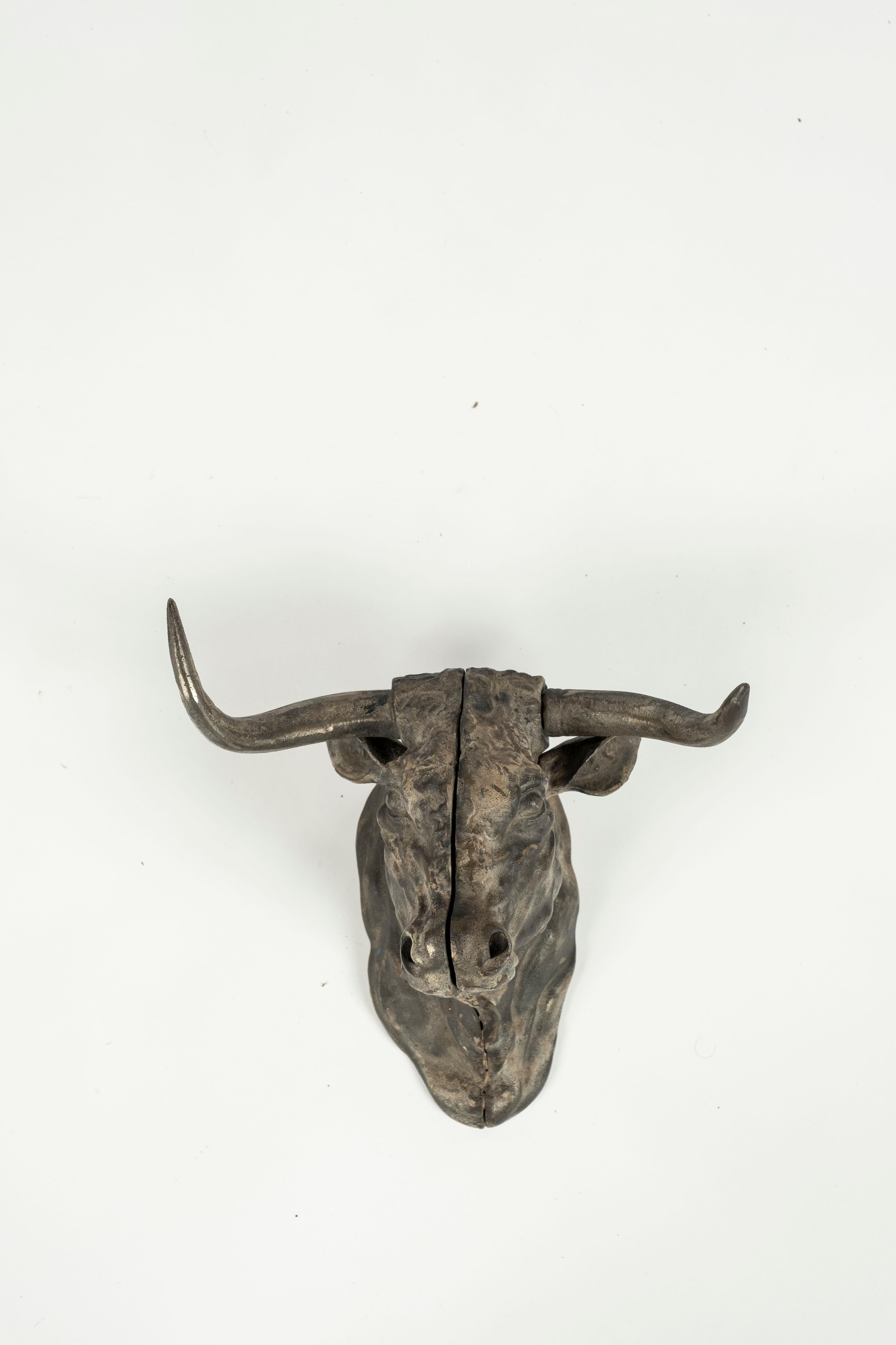 Original iron bull's head from France.