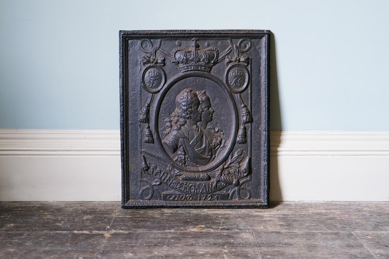 19th-century cast or wrought iron fireback with relief possibly depicting Frederick 4th of Denmark.

Dimensions: H57.5 x W50 cm.