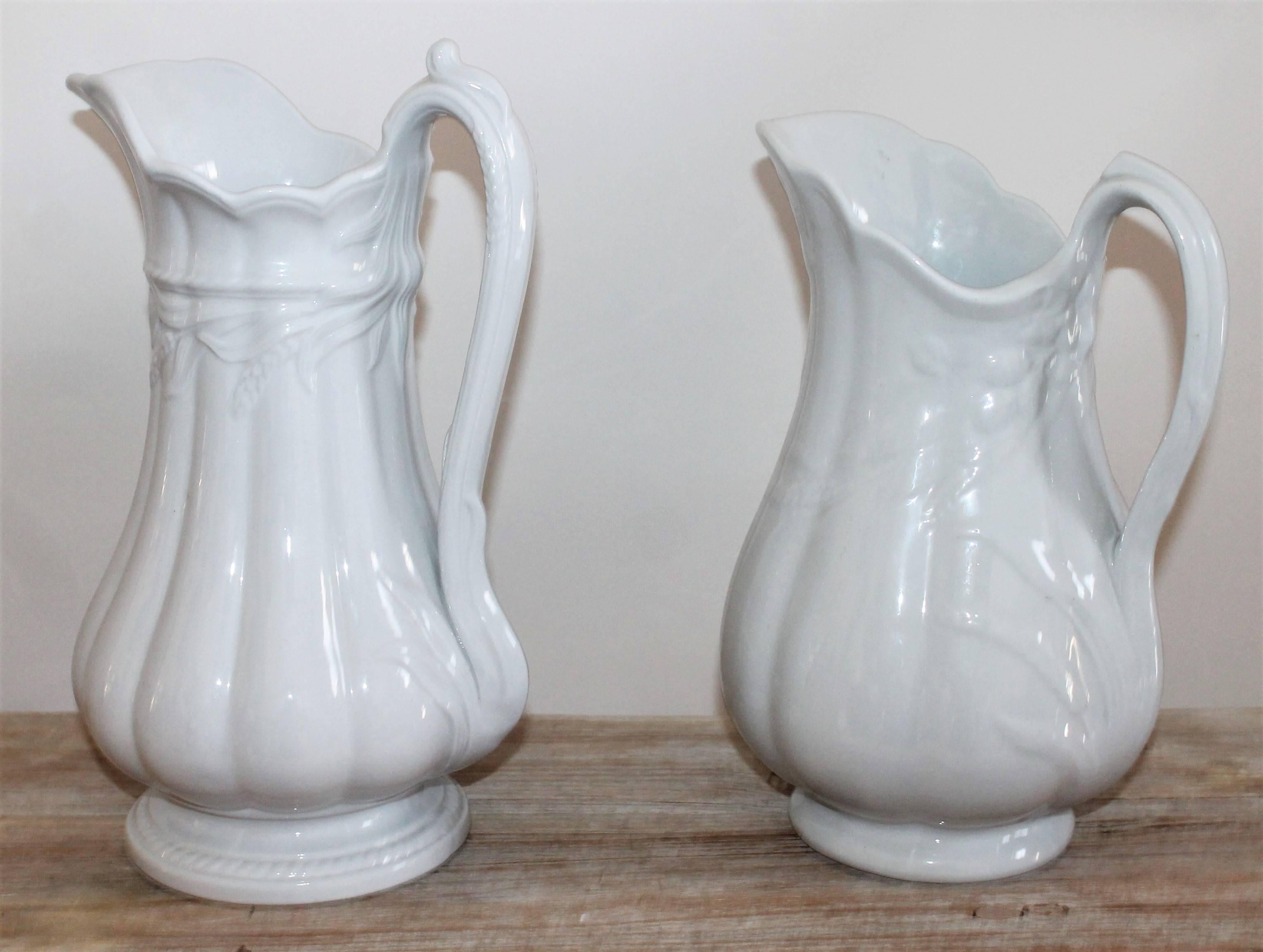 These two wheat pattern ironstone water pitchers are in fantastic pristine condition. Both are slightly different patterns.

Small pitcher measures: 8 x 11 x 6.5
Large pitcher measures: 8 x 12 x 7.