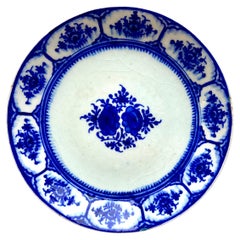 Assiette en poterie islamique bleue et blanche du 19ème siècle signée par le fabricant   