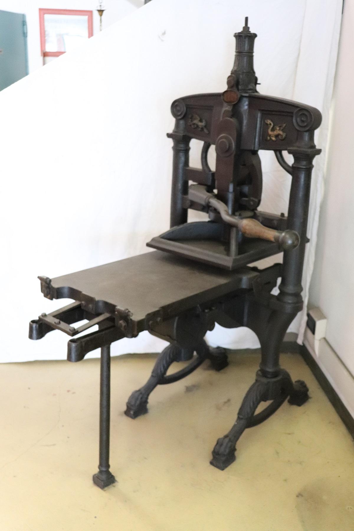 This rare item for sale is part of the history of typography. A beautiful example of a 19th century book press made entirely of iron. The iron is forged with decorative elements these characteristics were intended only for presses in use by
