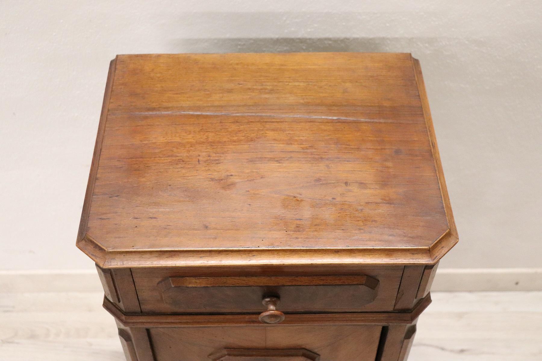 Rare and fine quality Italian antique nightstand. Made of fine linear and simple solid walnut wood with precious briar on the front. One comfortable drawer. The wood has a beautiful antique patina. Used, good condition.
      