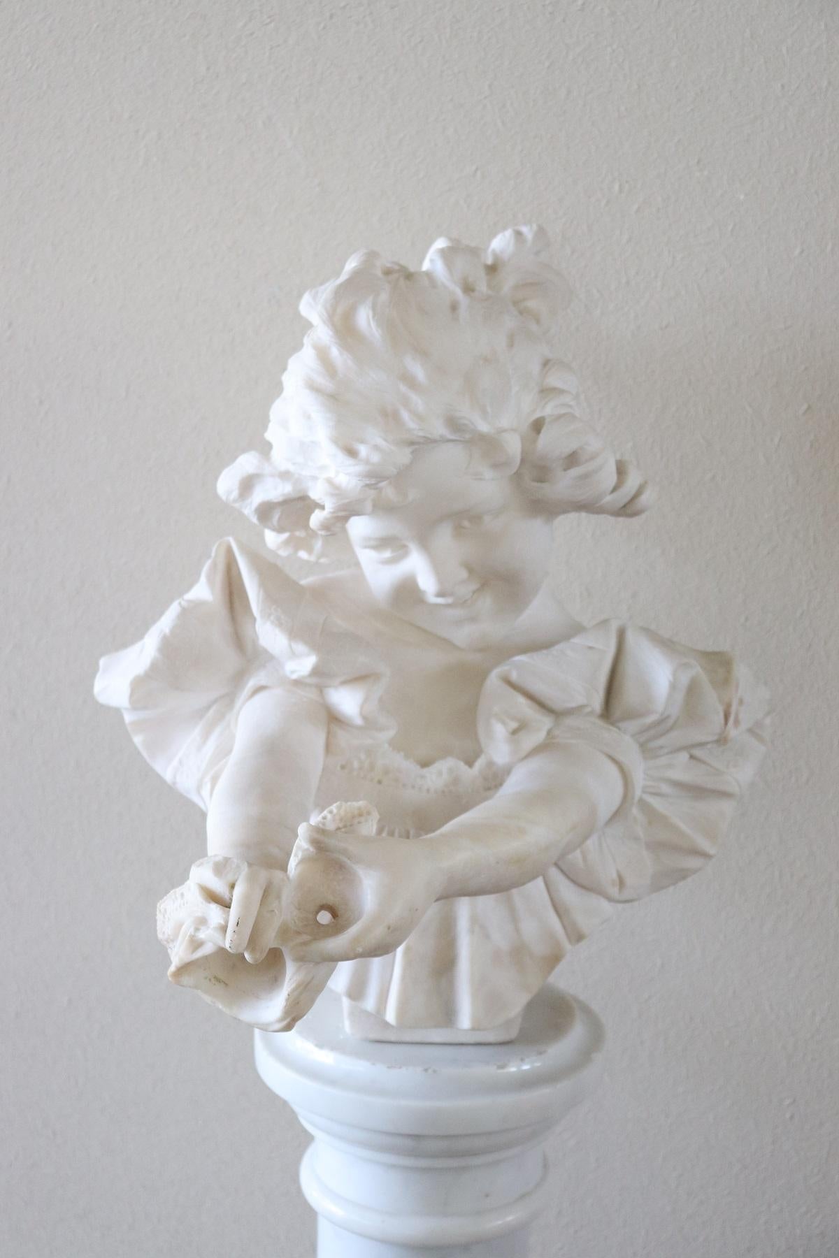 Beautiful bust of a beautiful child in white Carrara marble signed A. Frilli important Italian lorentine sculptor active between the late 1800s and early 1900s. This bust is sculpted with rare precision typical of the best Italian sculptors. The