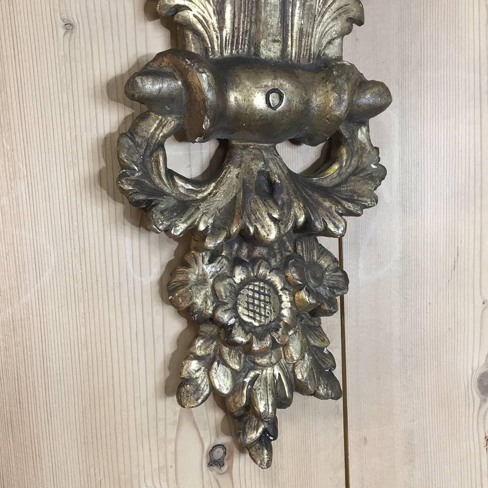 19th century Italian Baroque hand-carved wood gilt wood corbel - wall shelf, bracket is the ideal method to display a particularly cherished heirloom or objet d'art! The intricacies of the hand-sculpted detailing are amazing to behold, and the