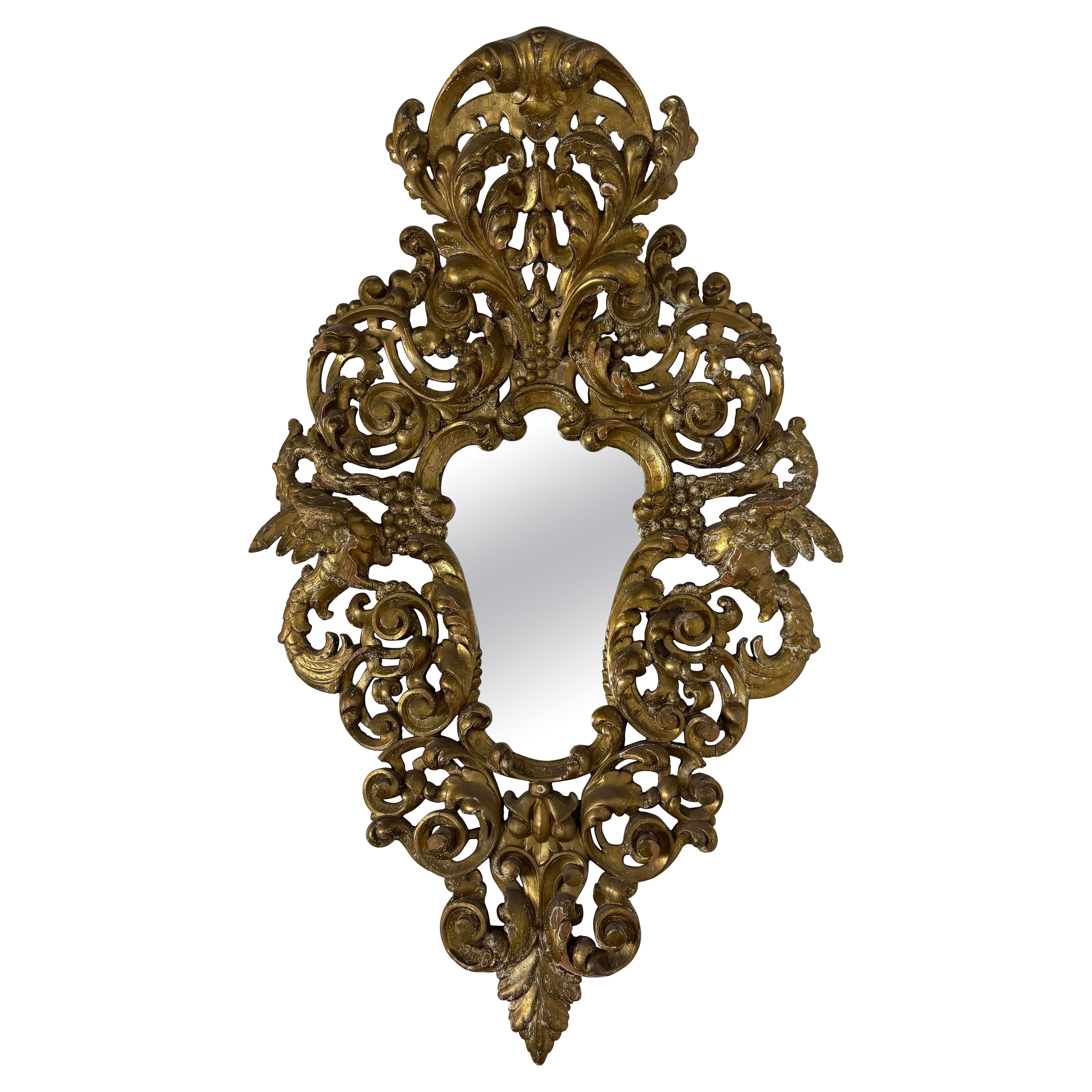 Specchio italiano del XIX secolo in stile barocco intagliato e in legno dorato
