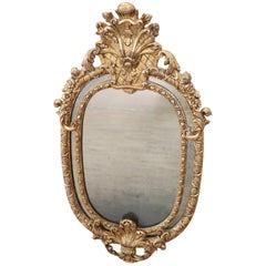 19th Century Italian Baroque Style Carved Gilded Wood Oval Wall Mirror