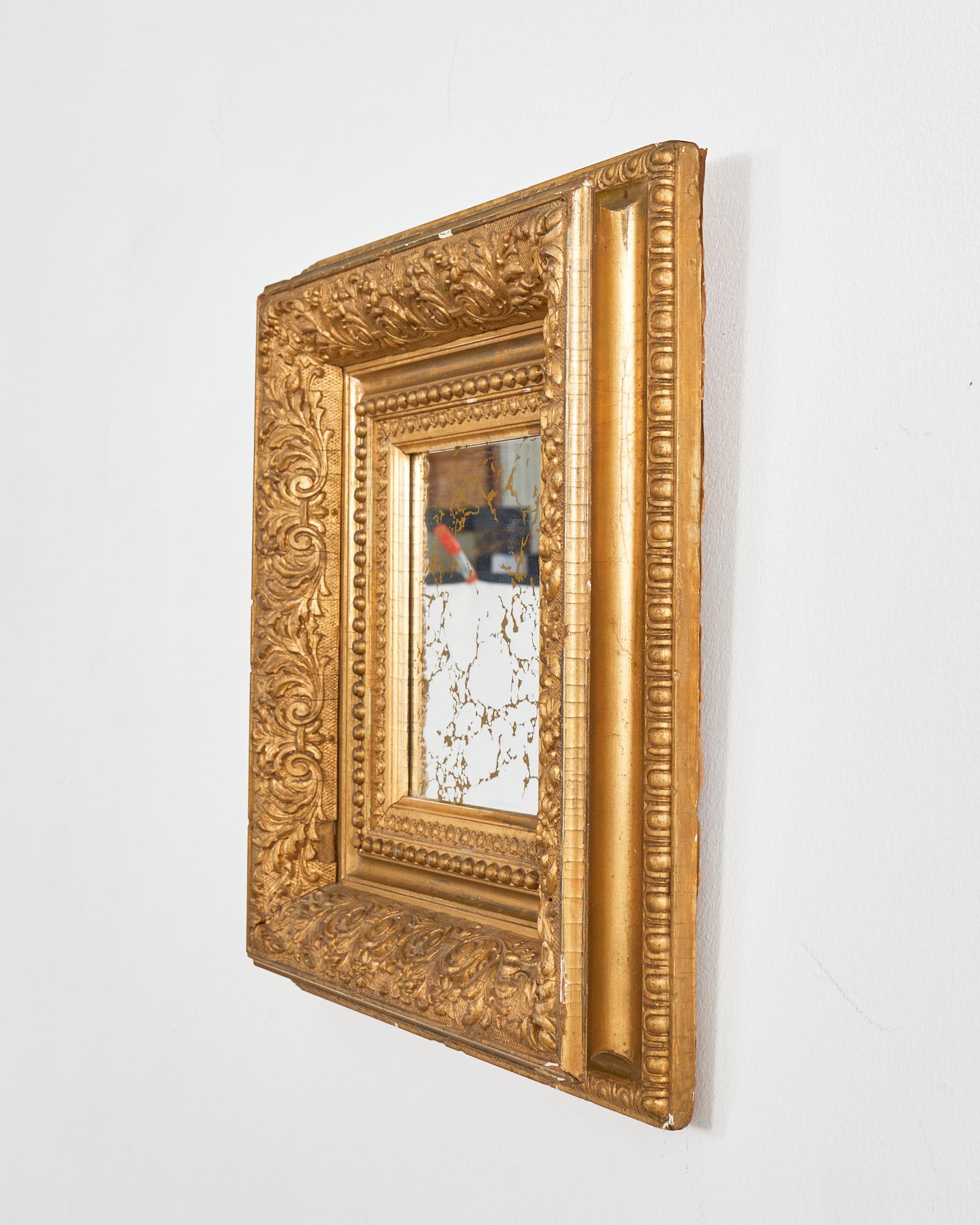 Hand-Crafted 19th Century Italian Baroque Style Carved Giltwood Wall Mirror For Sale