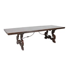 19th Century Italian Baroque Style Walnut Trestle Table with Iron Stretcher