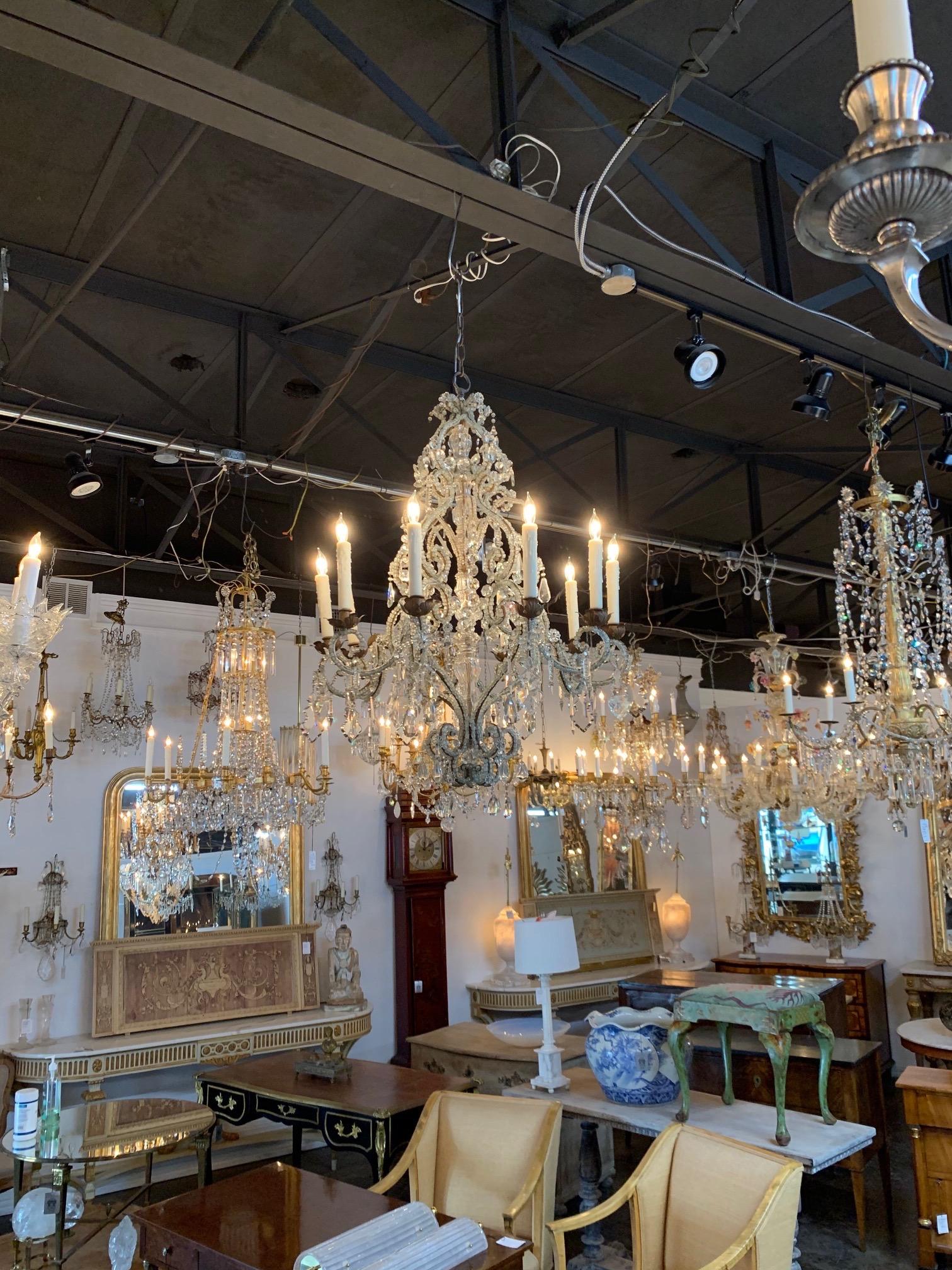 Elegant 19th century Italian beaded crystal chandelier with 10 lights. Beautiful curved base covered in beads and lovely dangling crystals. Stunning!