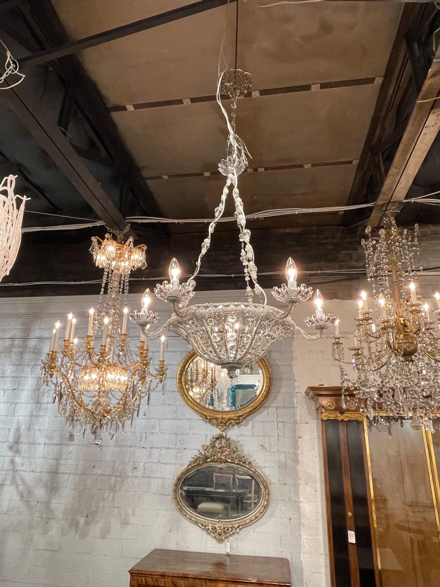 Lovely 19th century Italian crystal beaded basket chandelier with 7 lights. Beautiful floral beads along with other decorative images. So pretty!