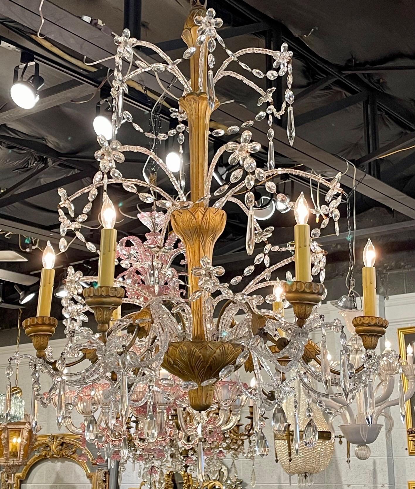 Lovely 19th century Italian beaded crystal and giltwood chandelier with 6-light. Cascading array of beads and crystals on a decorative carved base. Gorgeous!