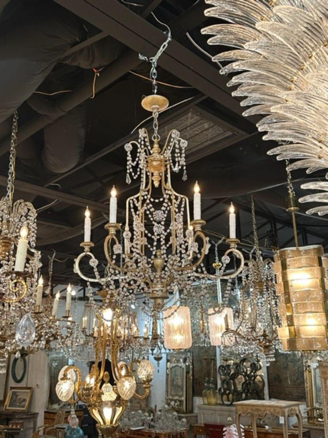 Beautiful 19th century Italian crystal and silver gilt pagoda chandelier with 6 lights.  Makes an elegant statement!
